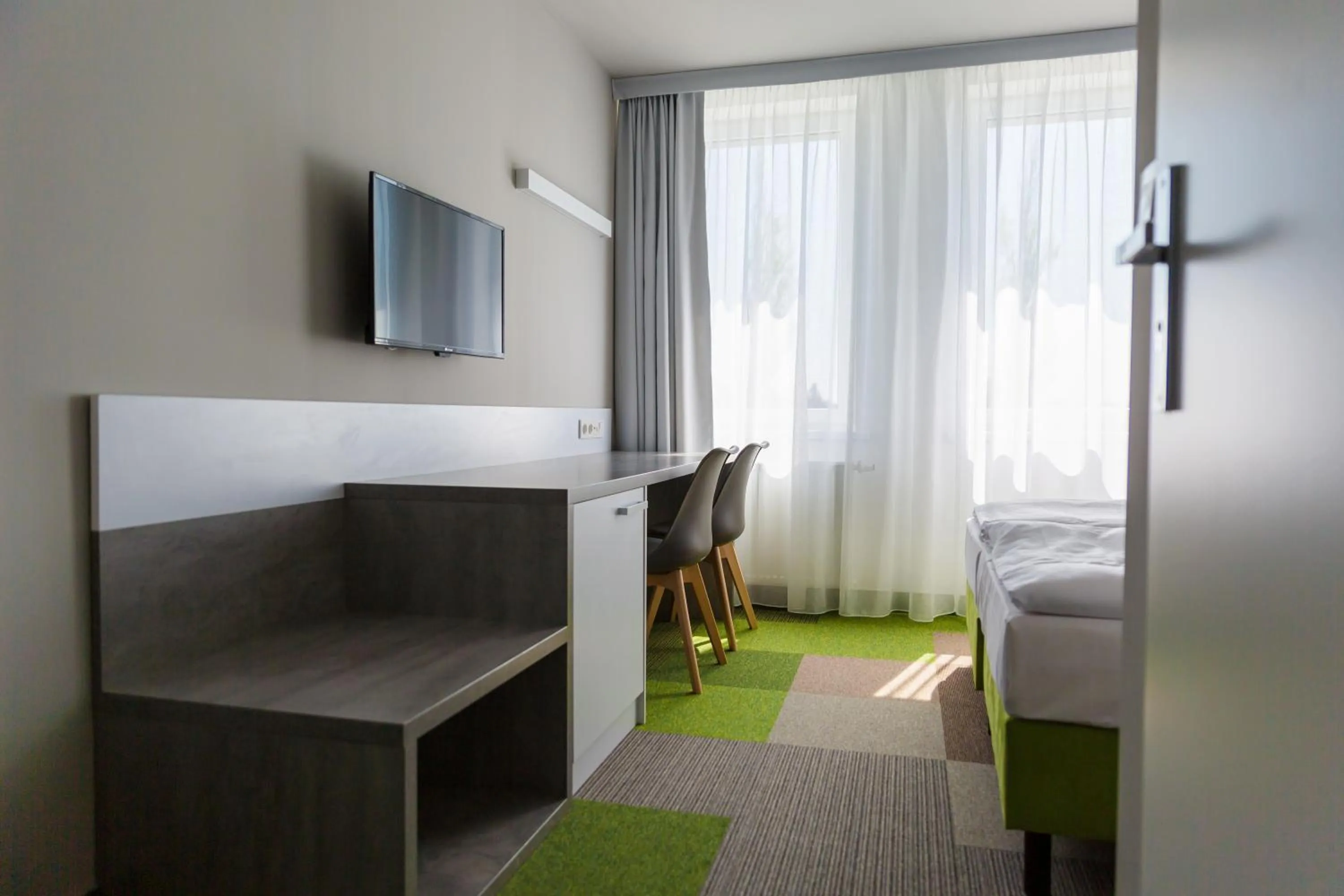 Bed in Hotel Quattro