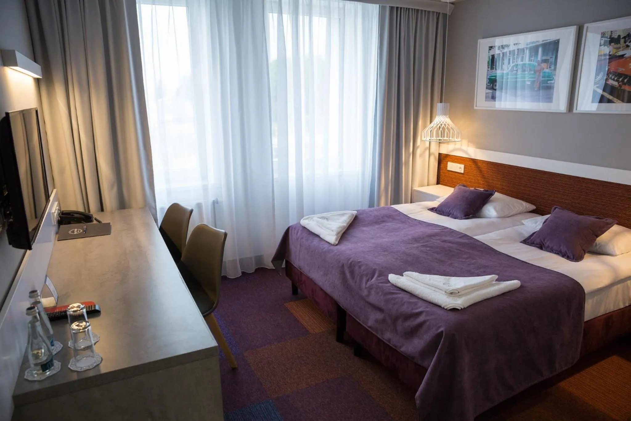 Bed in Hotel Quattro