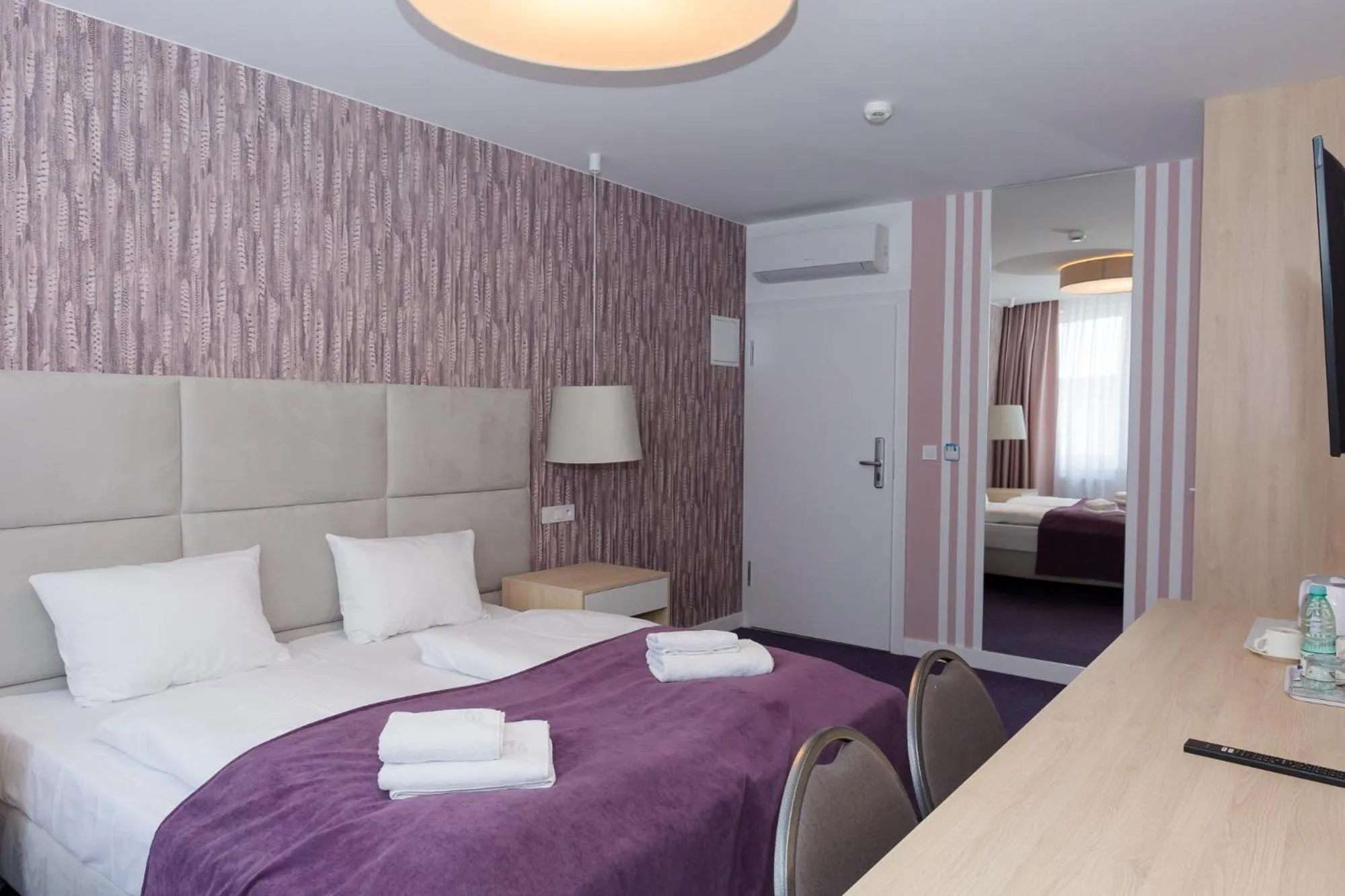 Bed in Hotel Quattro