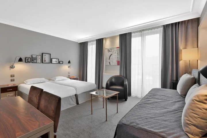 Bed in Hôtel Londres et New York - Teritoria