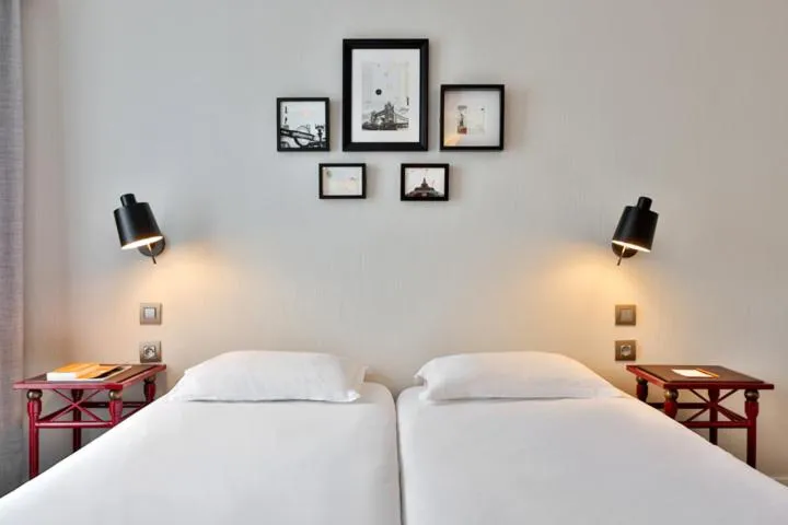 Bed in Hôtel Londres et New York - Teritoria