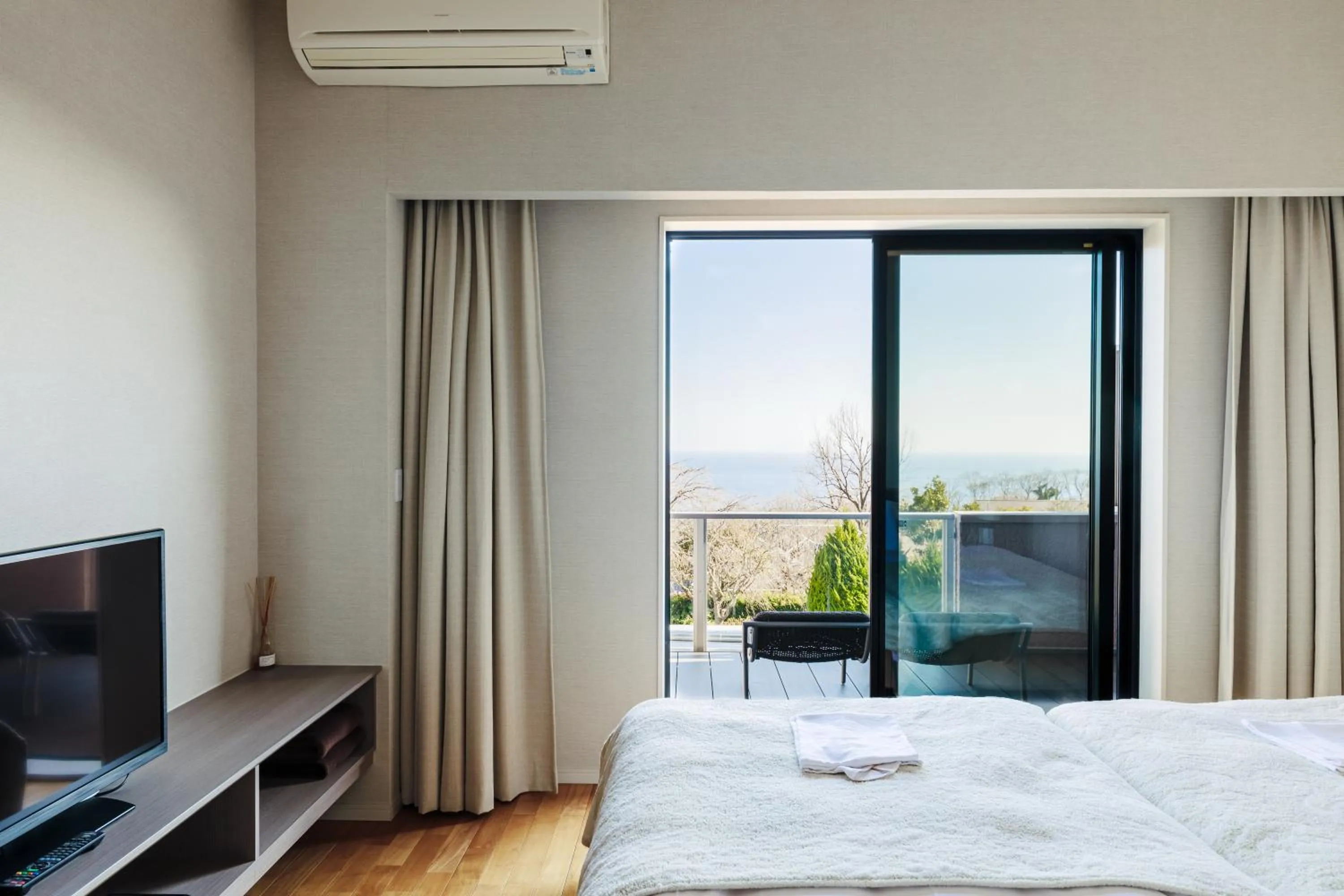 Bed in the salon 伊豆高原 Hotels & Resort