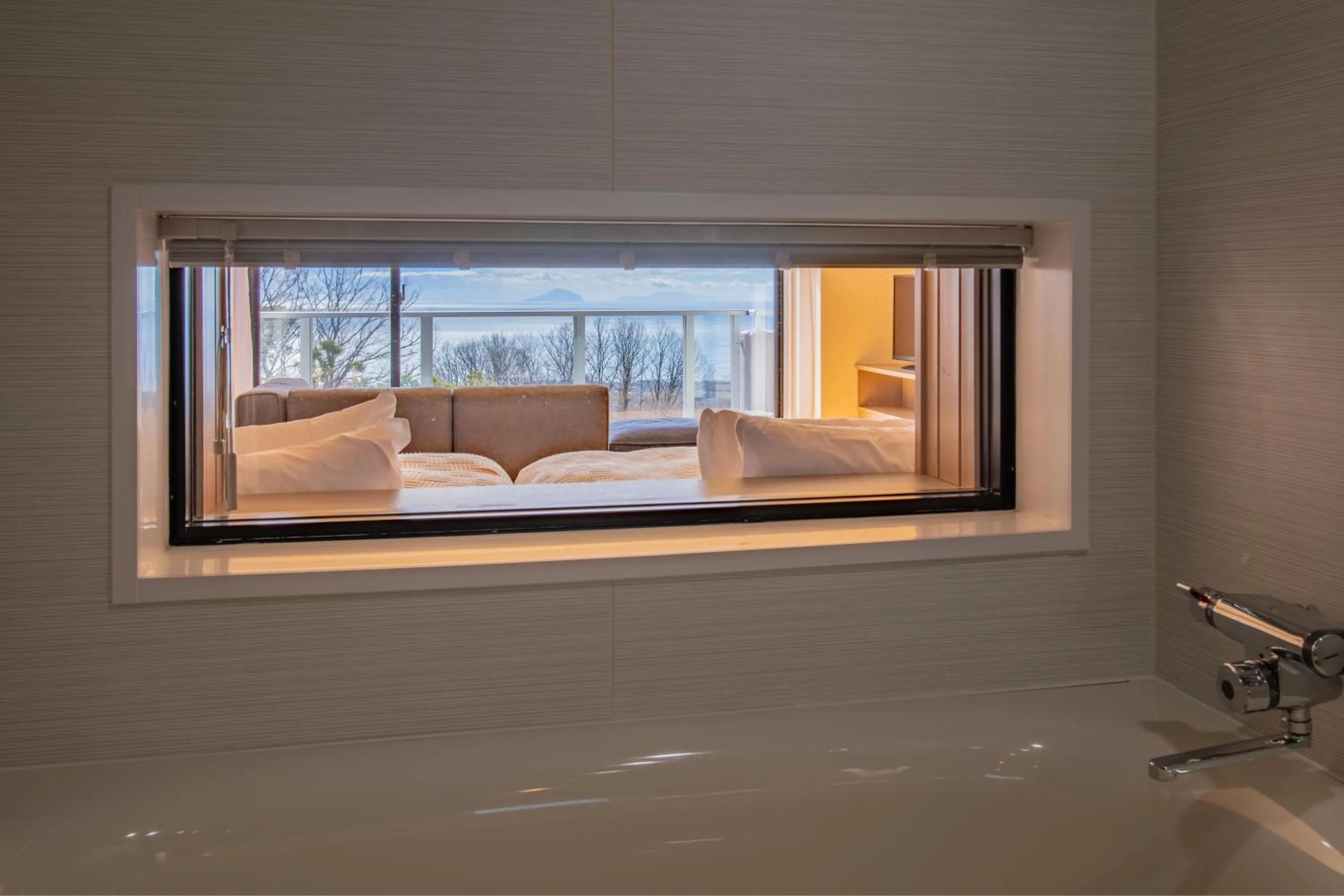 Bathroom, Bed in the salon 伊豆高原 Hotels & Resort