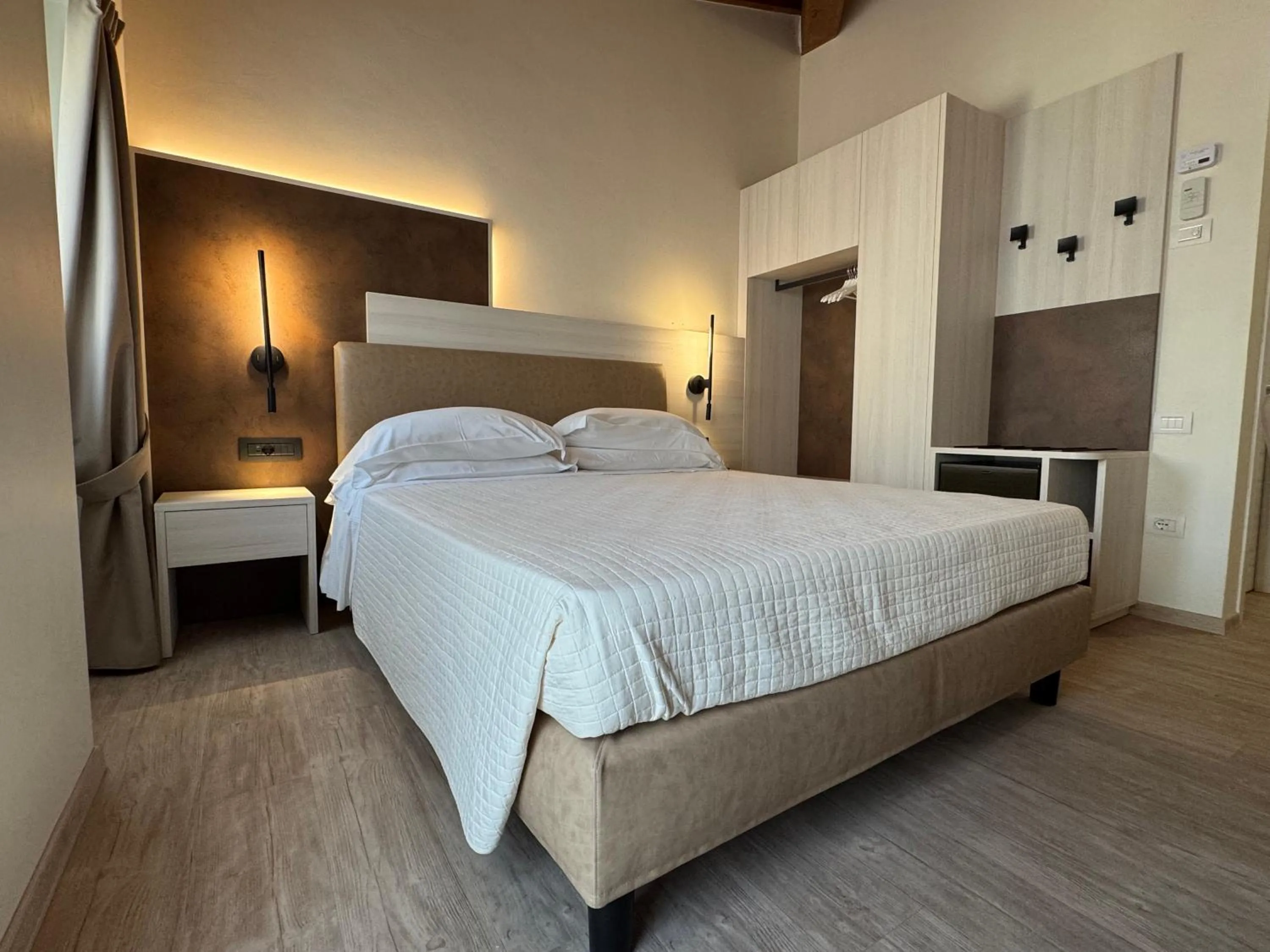 Bed in Hotel Roma