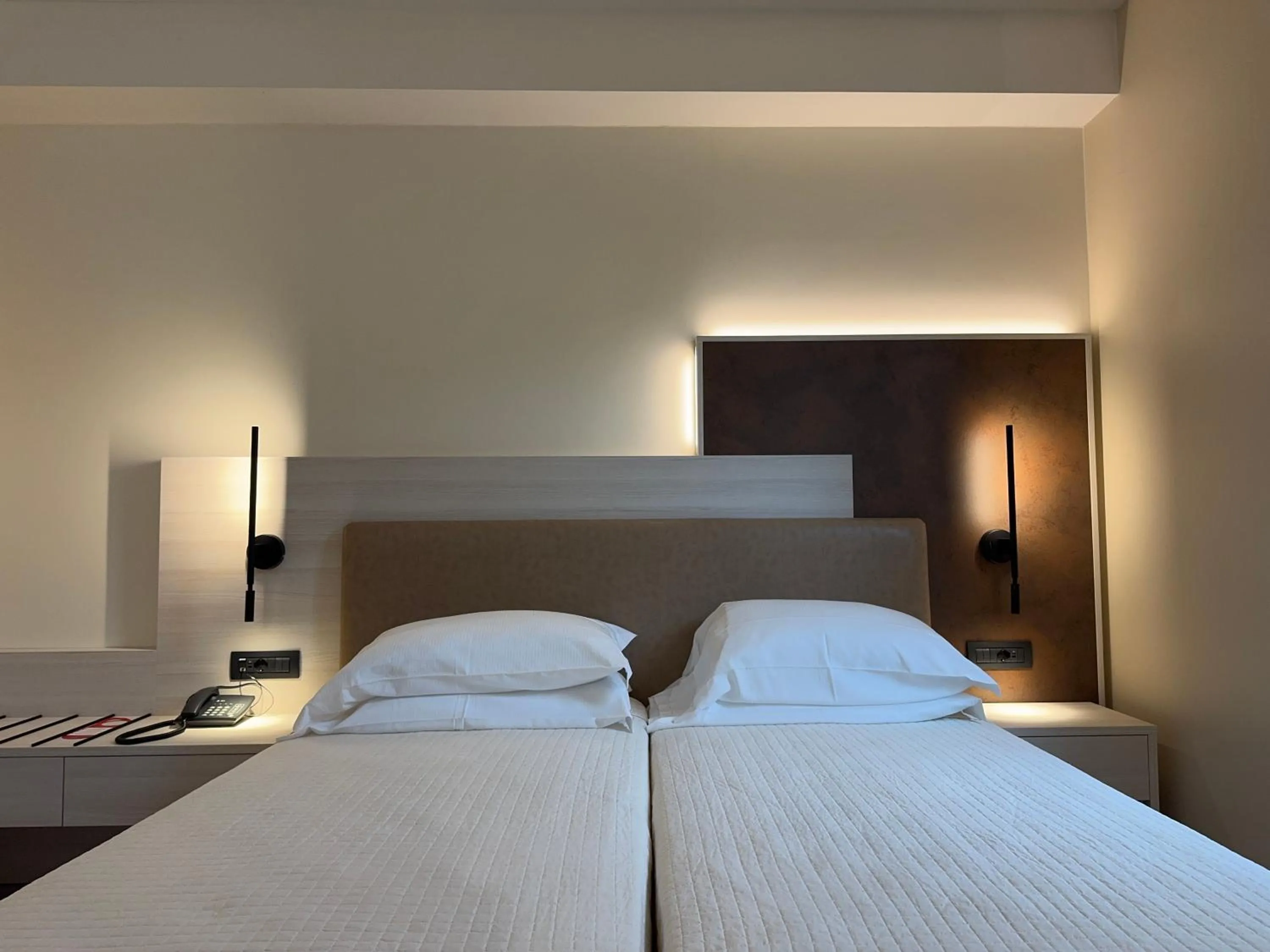 Bed in Hotel Roma