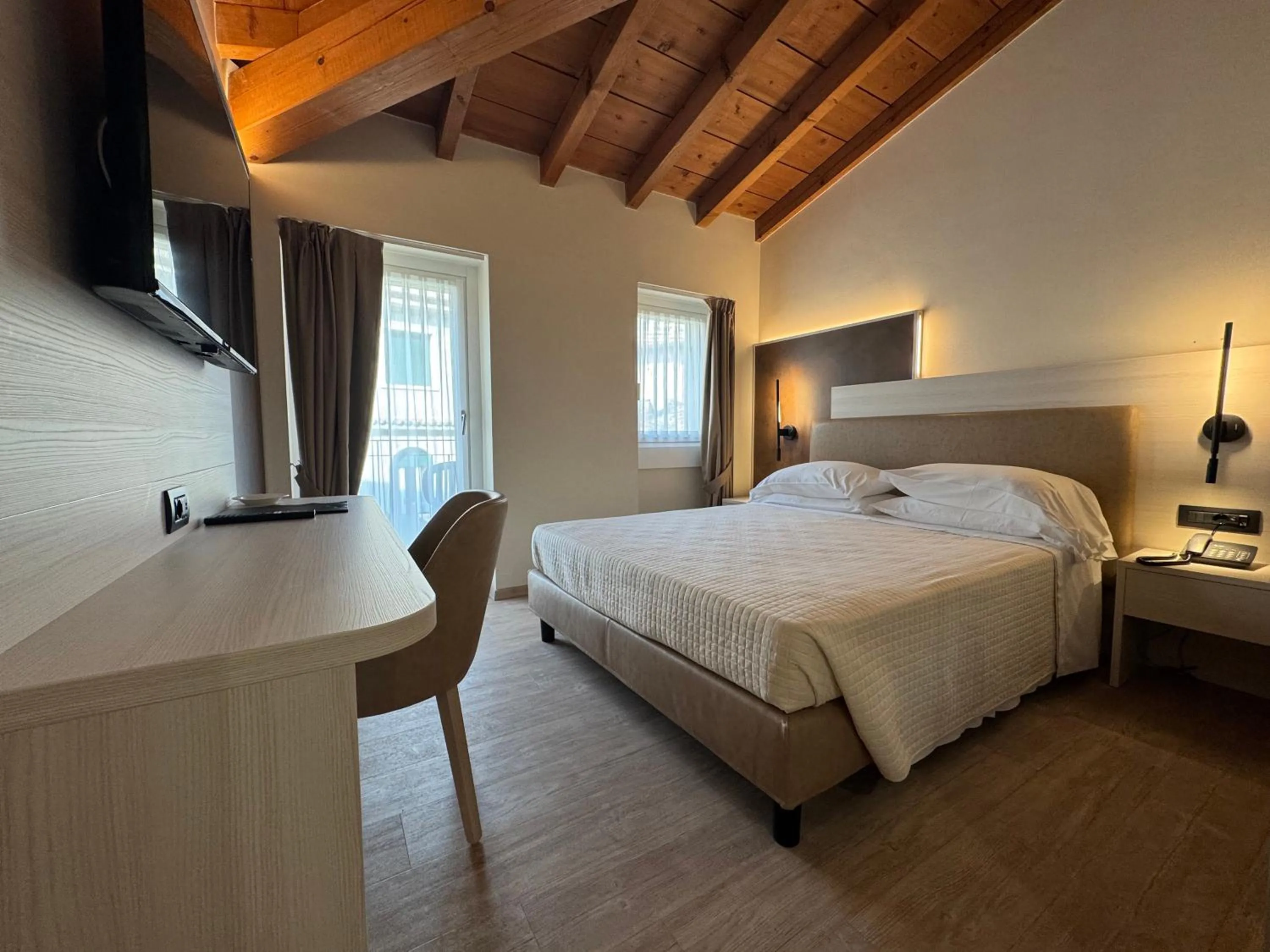 Bed in Hotel Roma