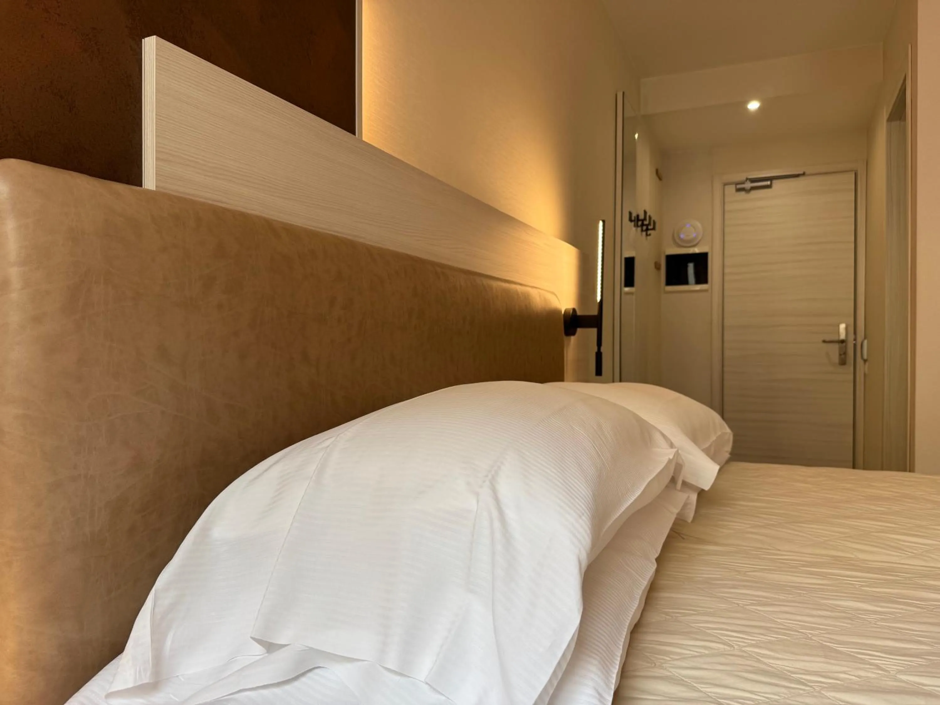 Bed in Hotel Roma