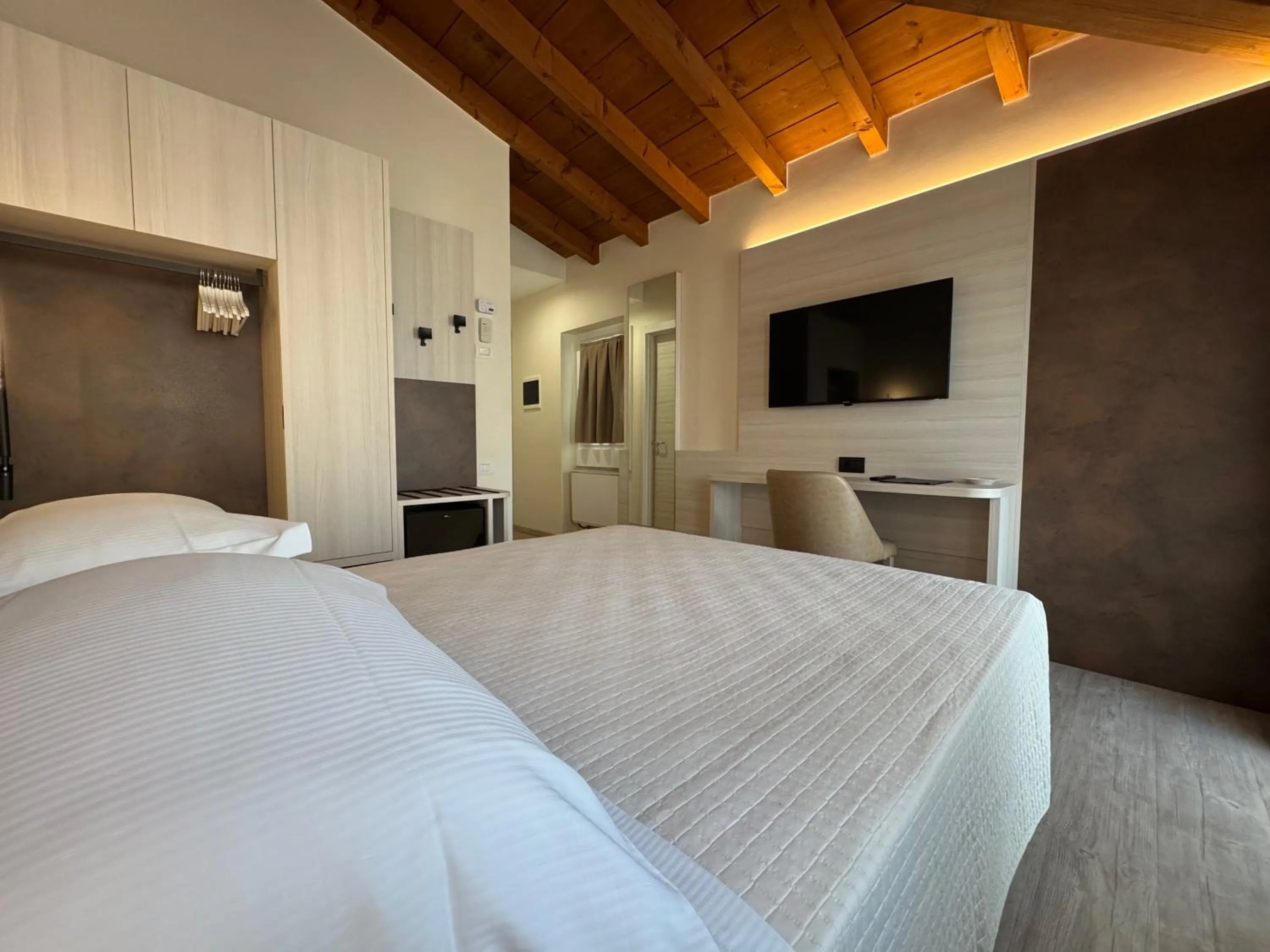 Bed in Hotel Roma