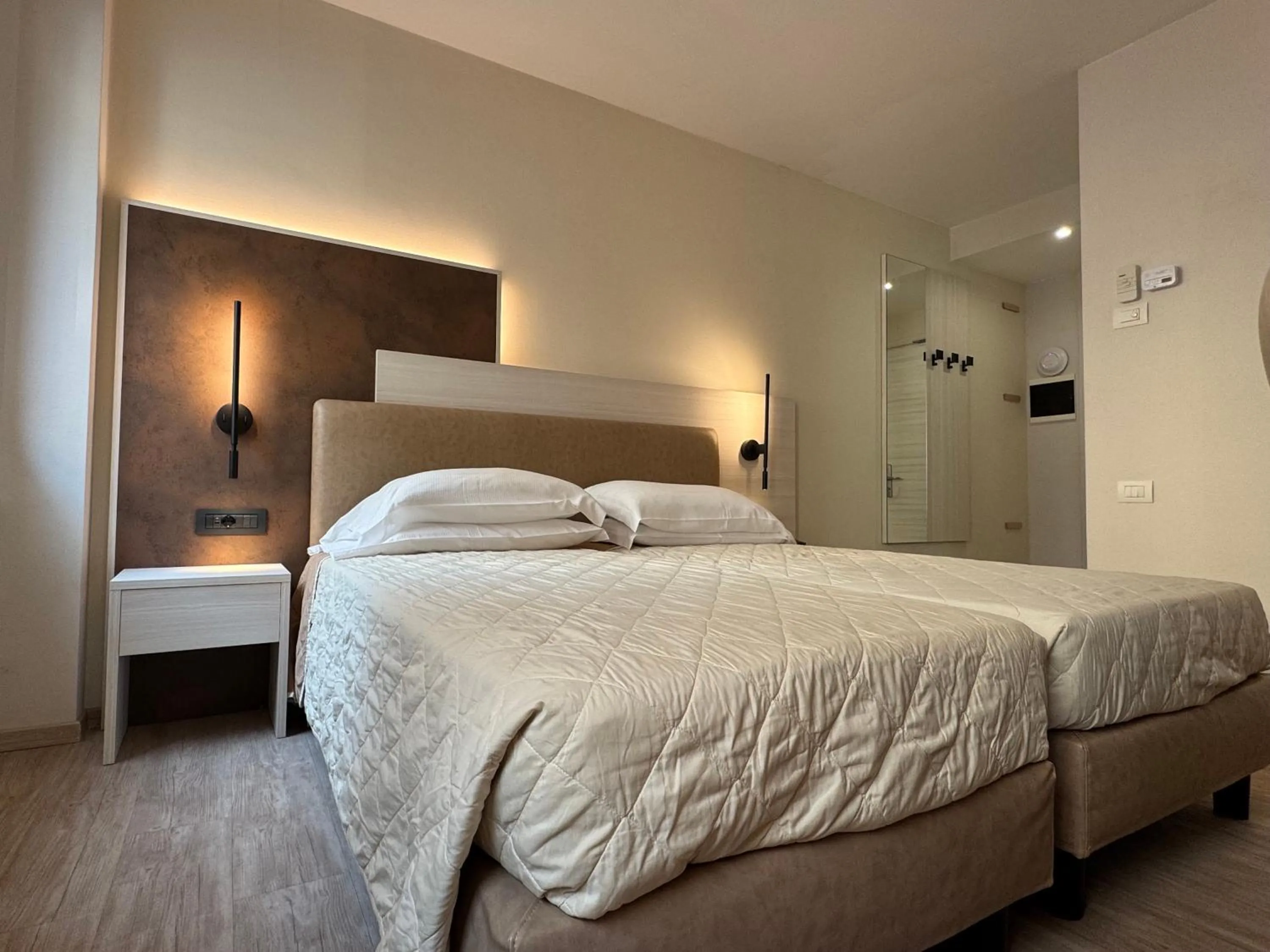 Bed in Hotel Roma
