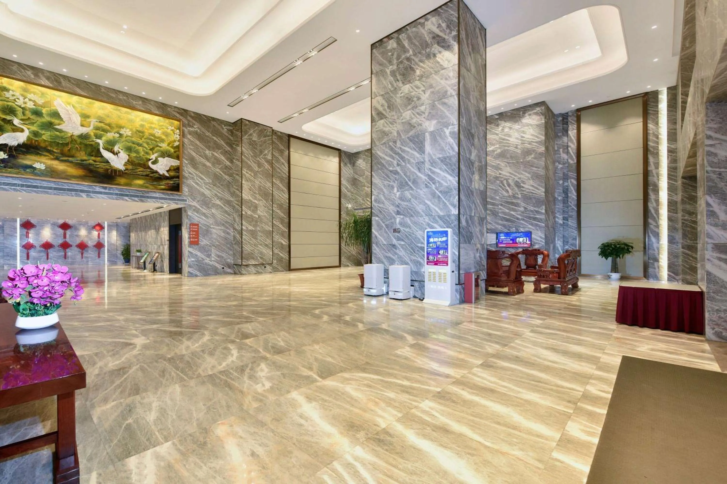 Lobby or reception in Ramada Plaza by Wyndham Dongxing City Center