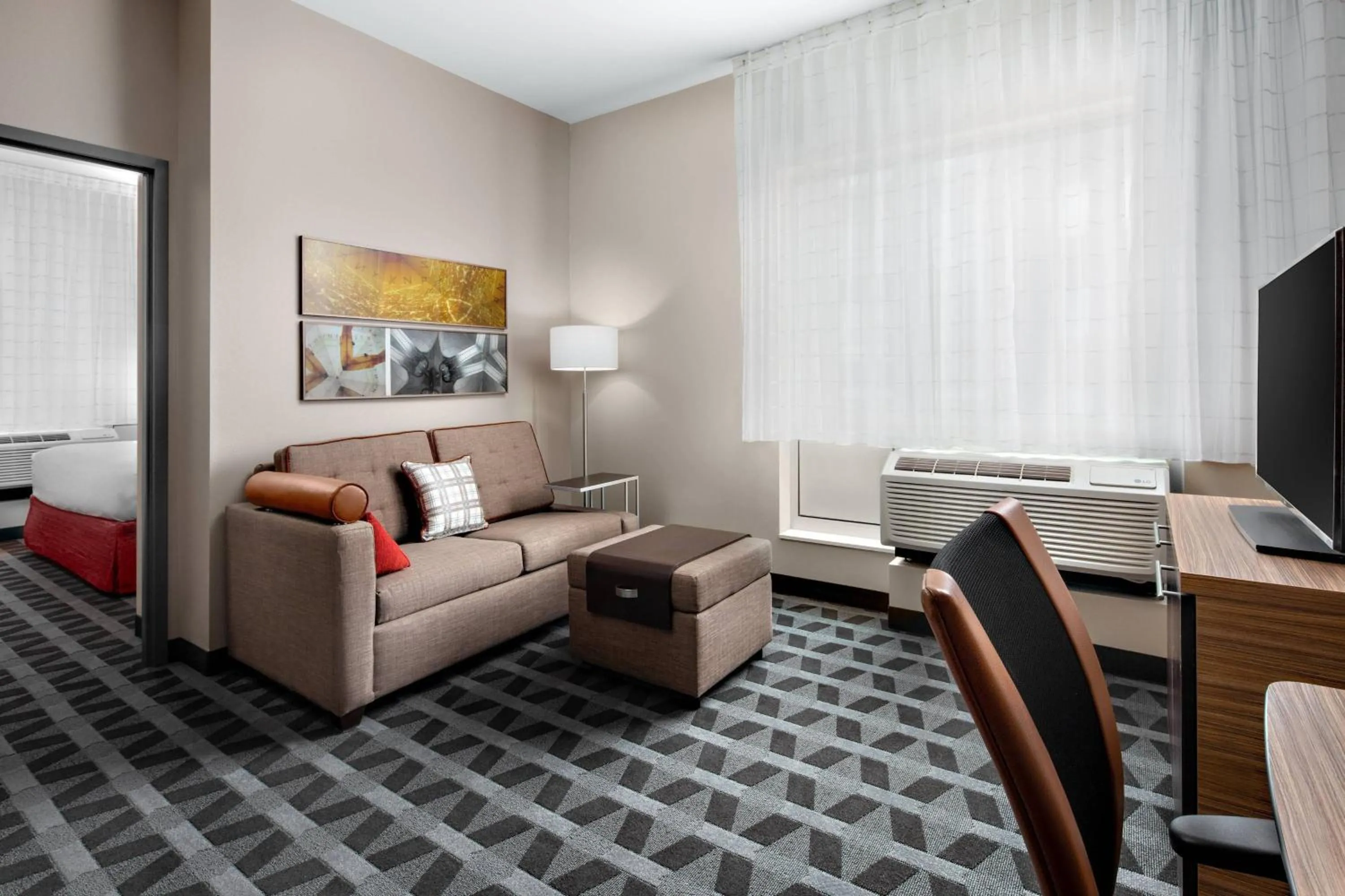 Living room in TownePlace Suites by Marriott Loveland Fort Collins