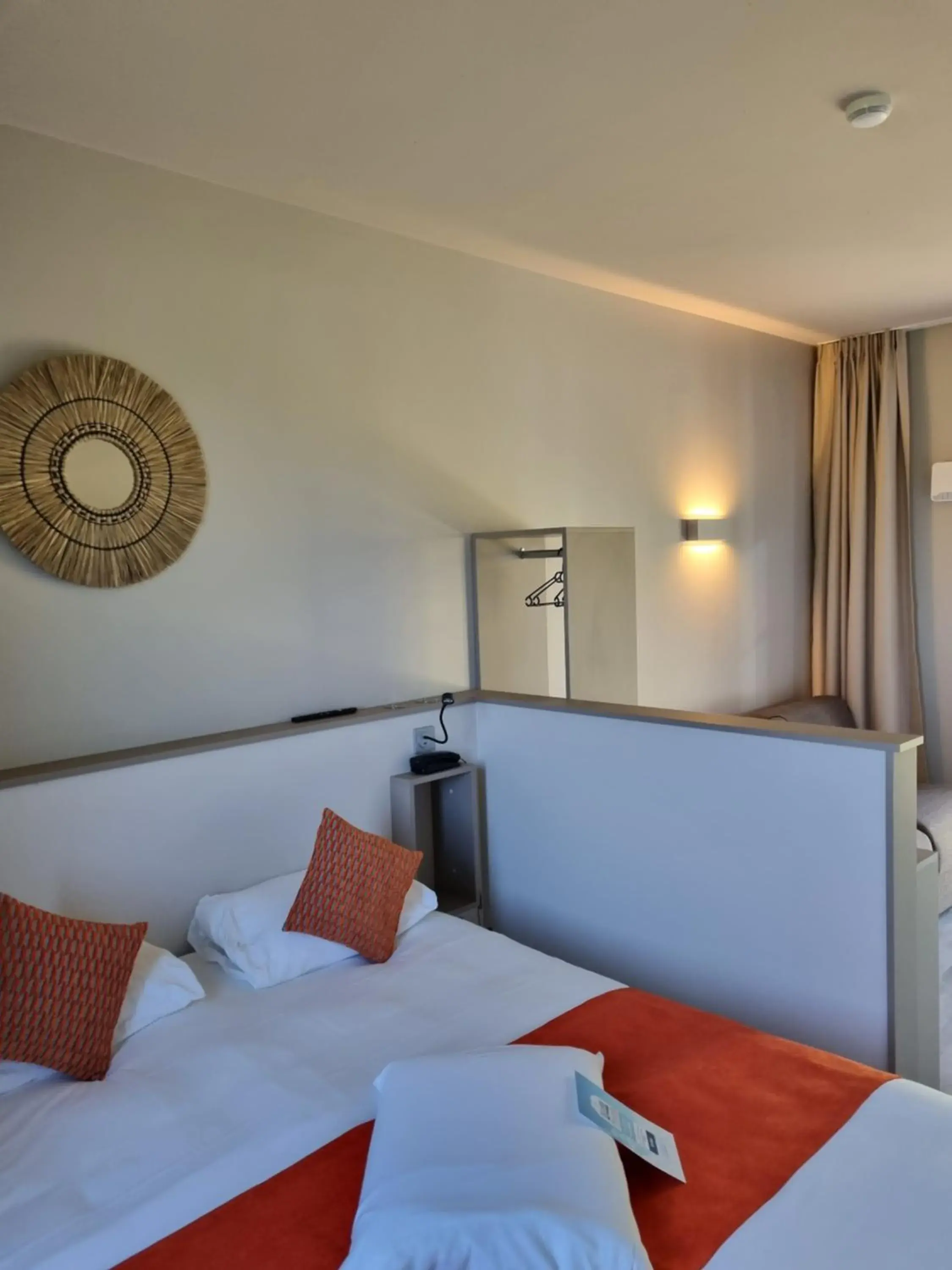 Superior Quadruple Room with a Sofa Bed and a Kitchenette in Kyriad Angoulême Nord Champniers- Hôtel & Résidence Superior Quadruple Room with a Sofa Bed and a Kitchenette in Kyriad Angoulême Nord Champniers- Hôtel & Résidence