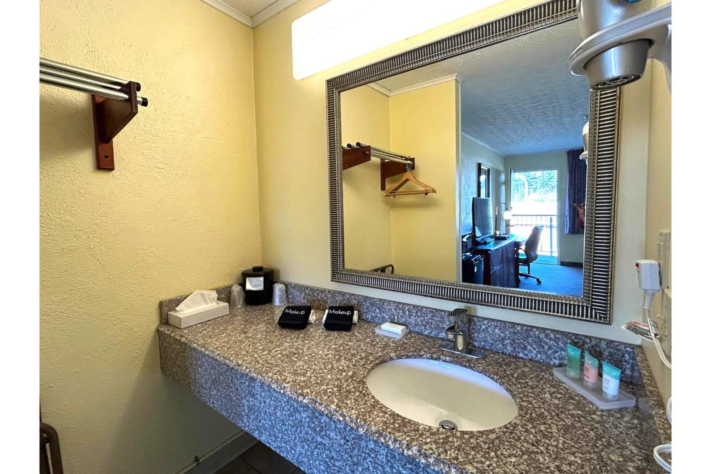 Bathroom in Lake Logan Inn Capital O Ohio