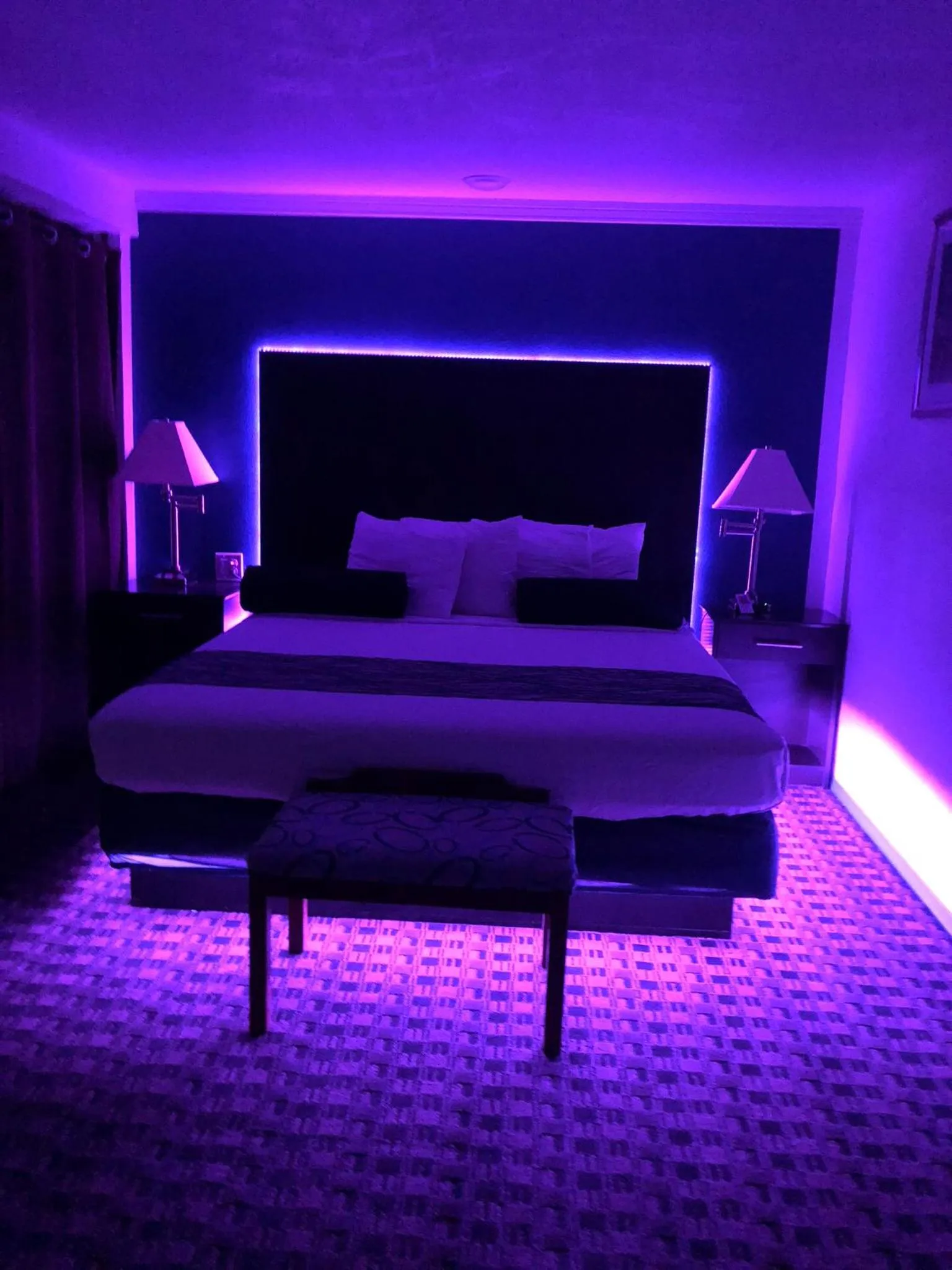 Bed in Budget Inn & Suites