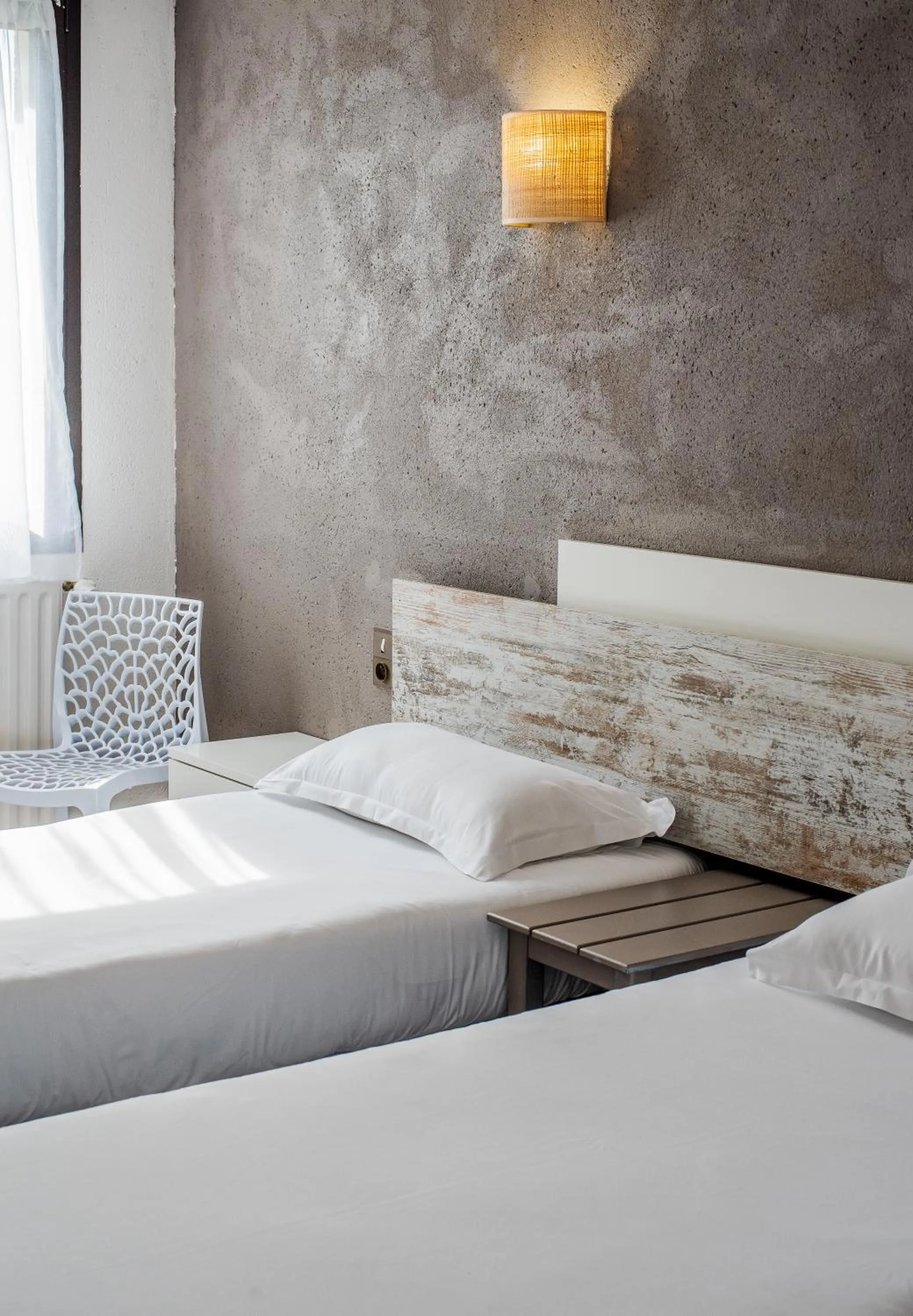 Bed in Hôtel La Tour des Anglais