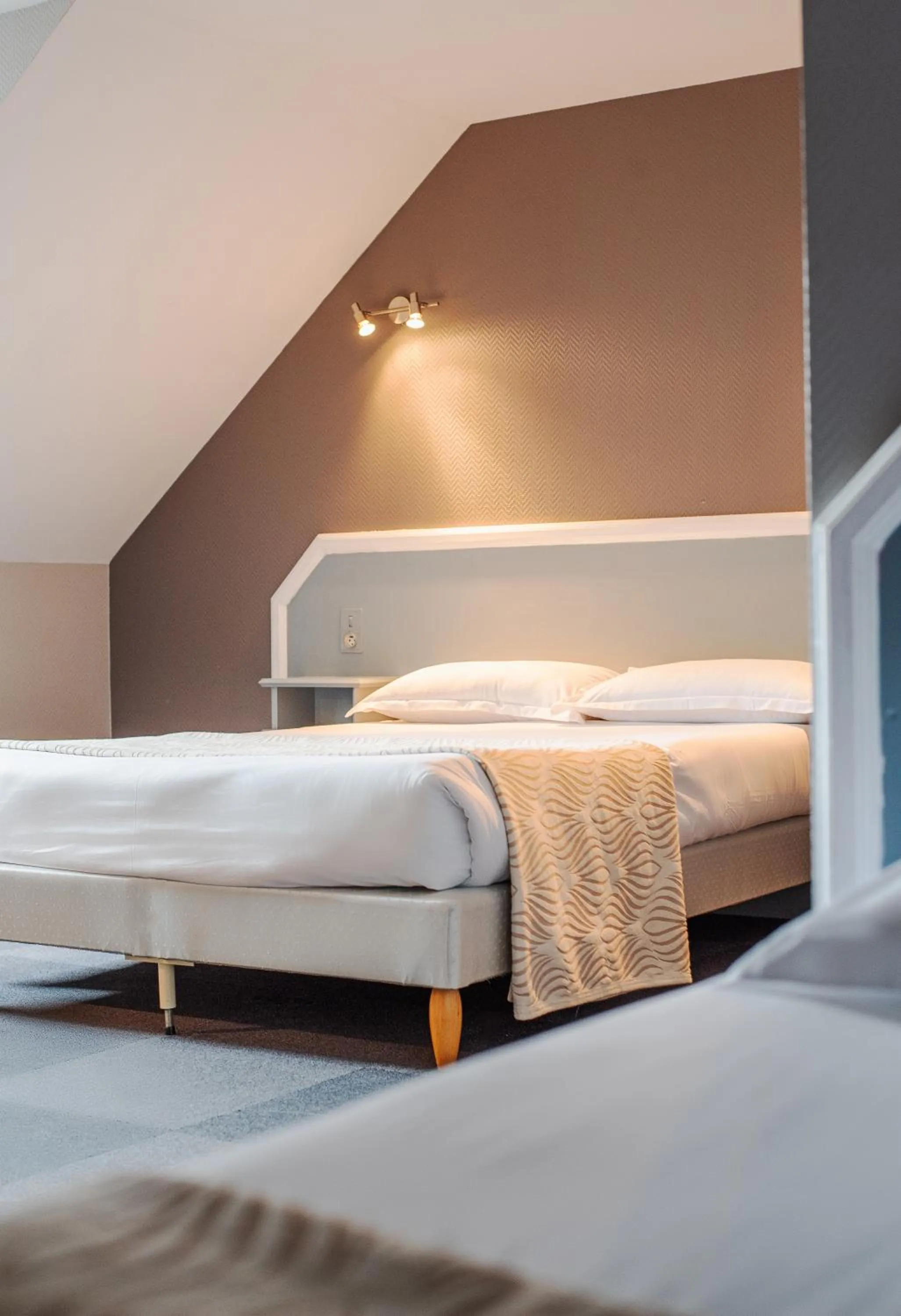 Bed in Hôtel La Tour des Anglais