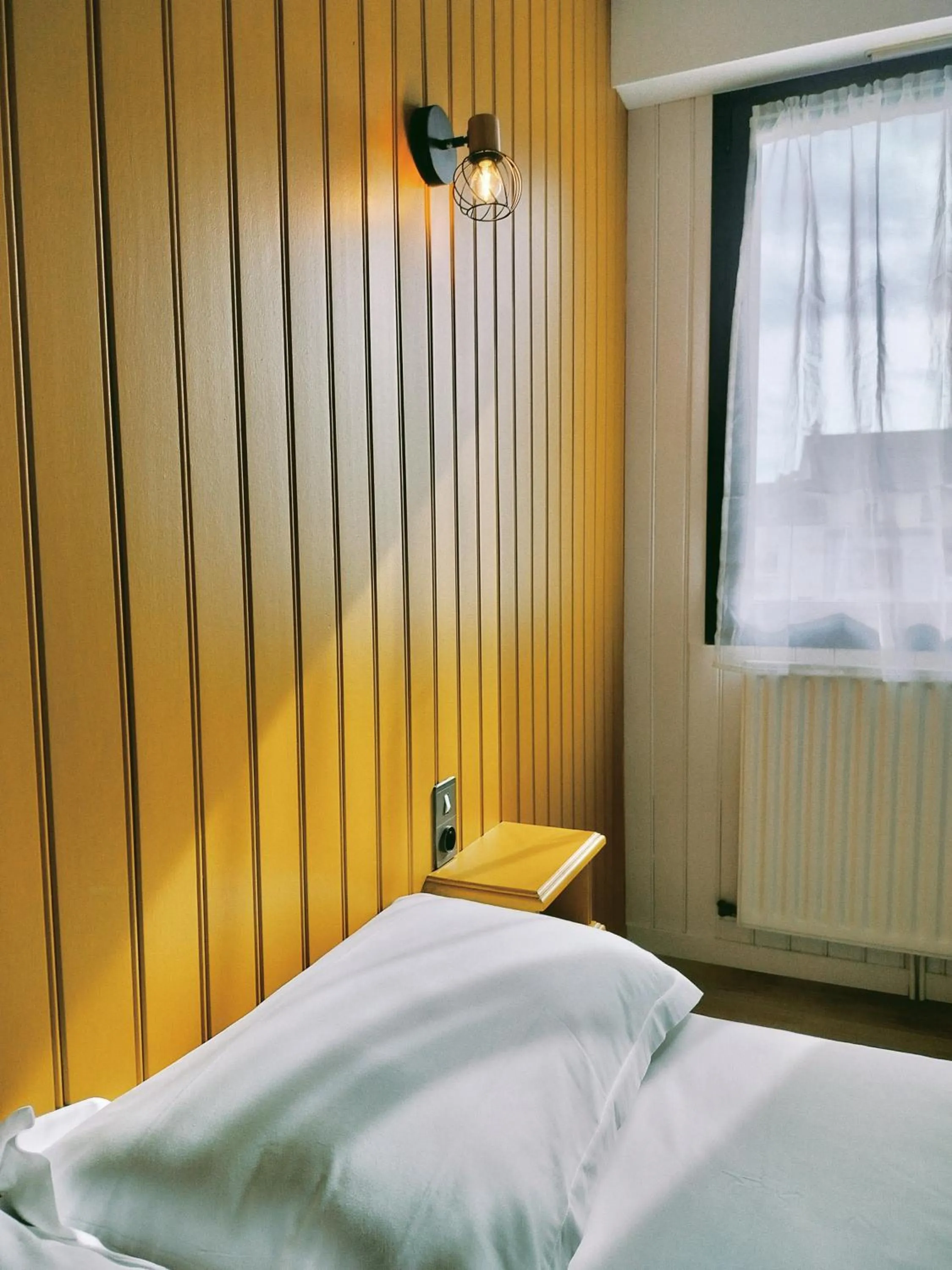 Bed in Hôtel La Tour des Anglais