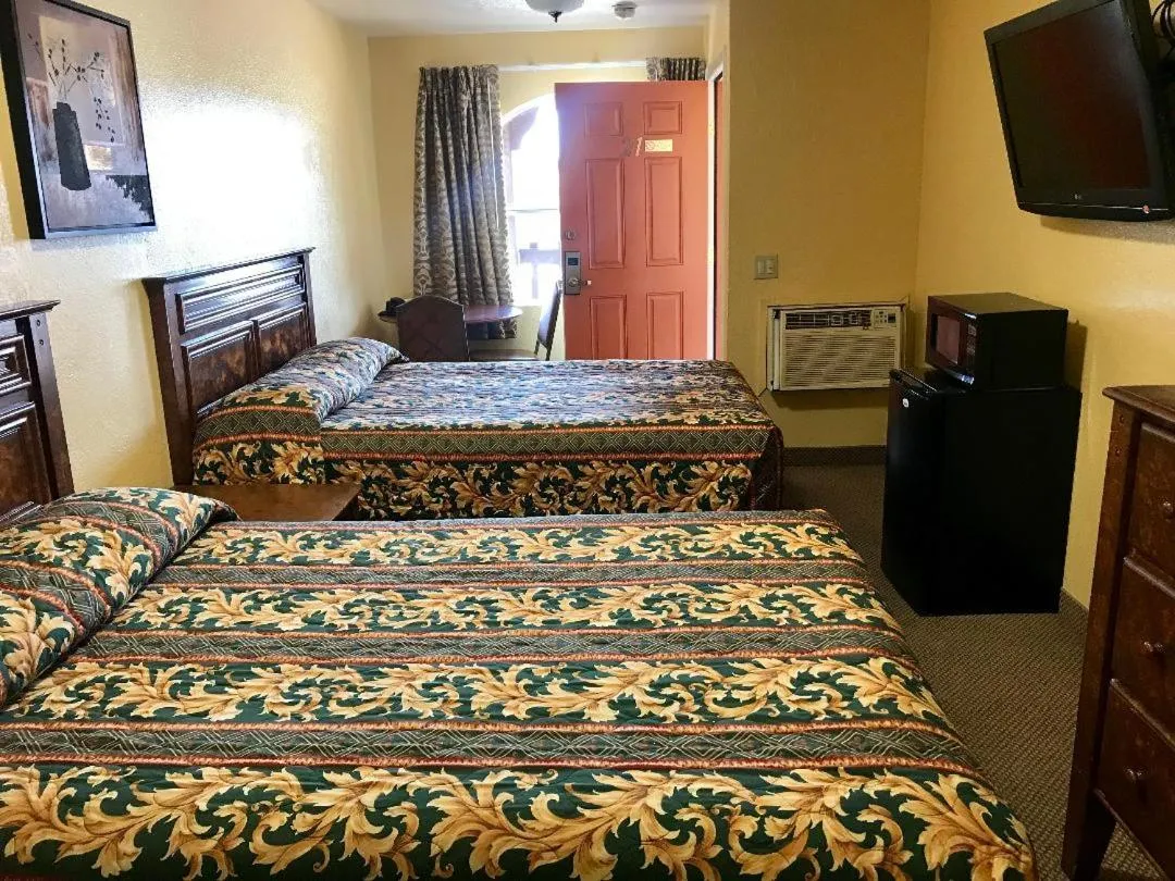 Bed in Hacienda Motel