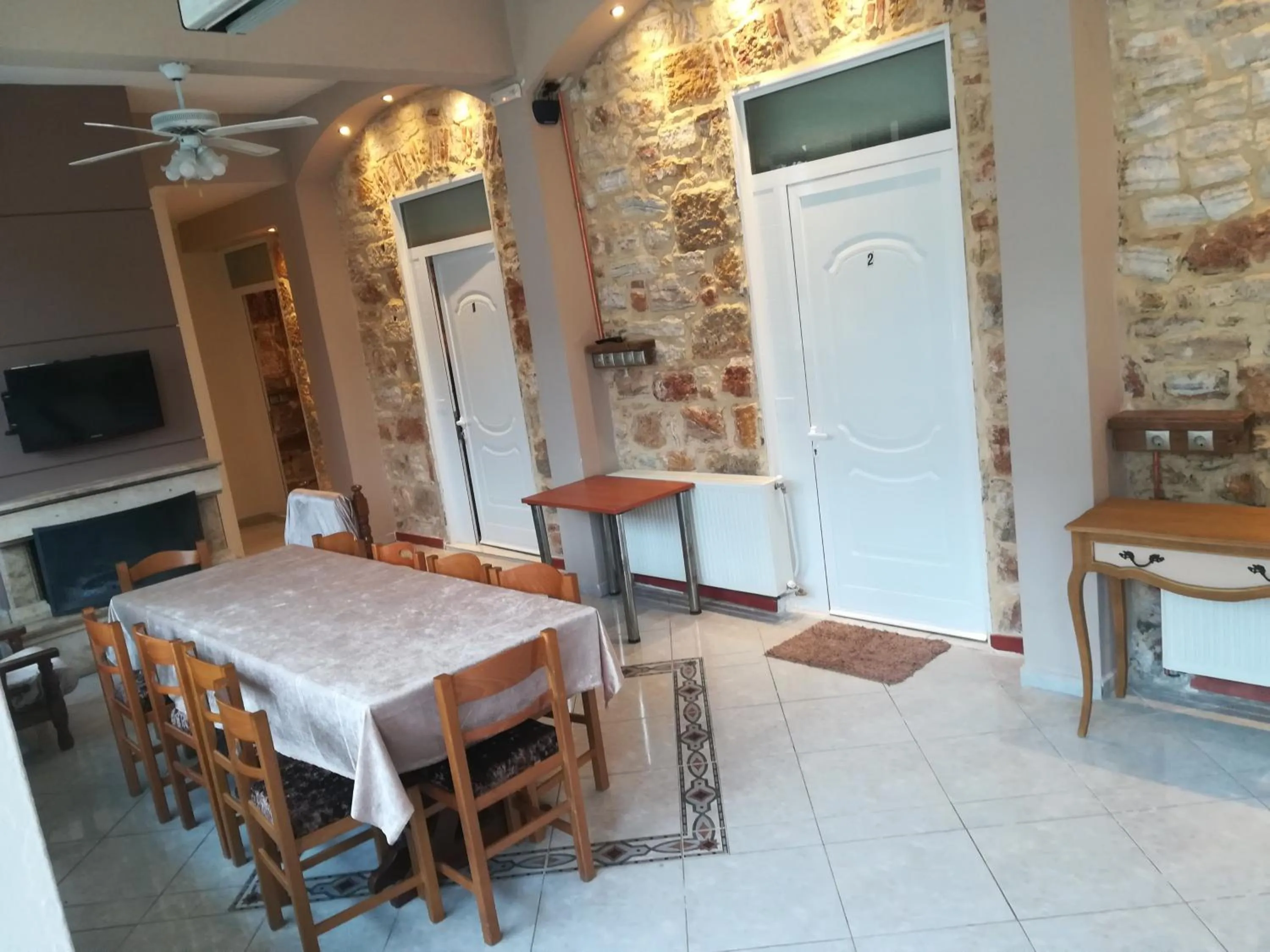 Communal lounge/ TV room in Skourtaniotis spa rooms