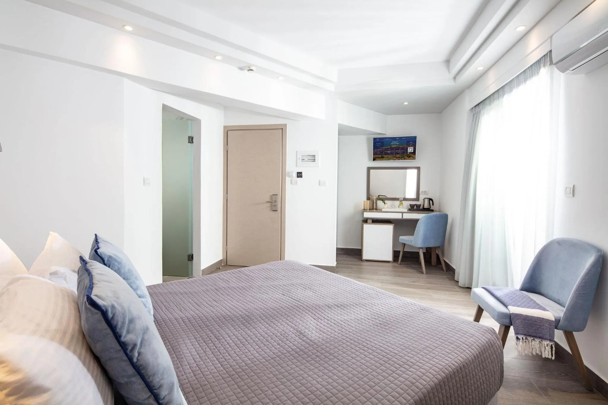 Bed in ALKINOI RESORT AND SPA