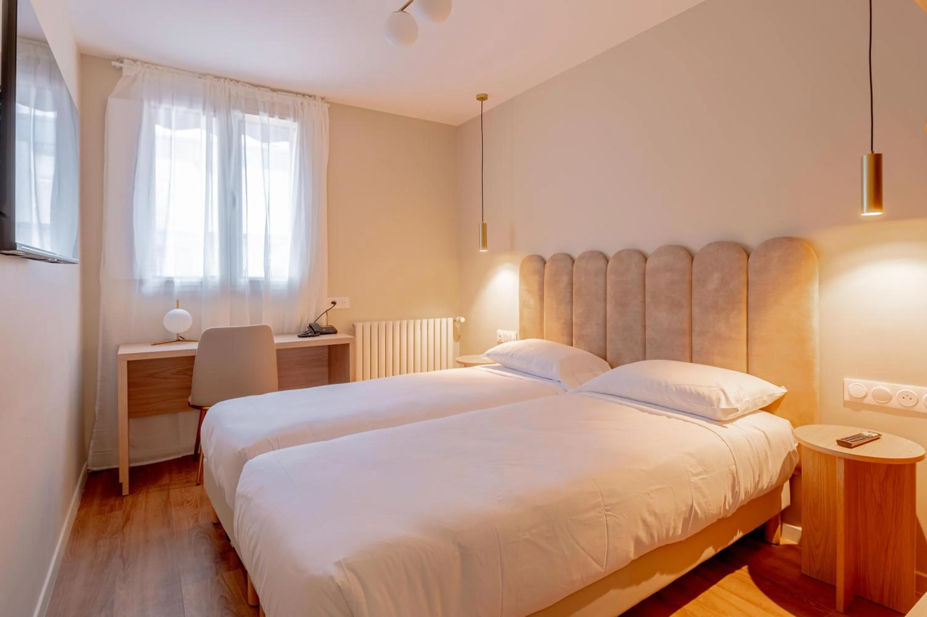 Bed in Grand Hotel Sénia - Paris Orly Airport