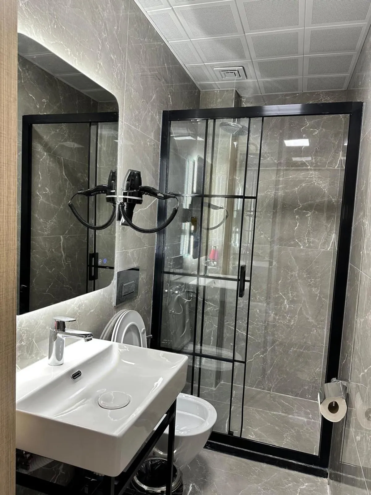 Shower in Grand FM Hotel