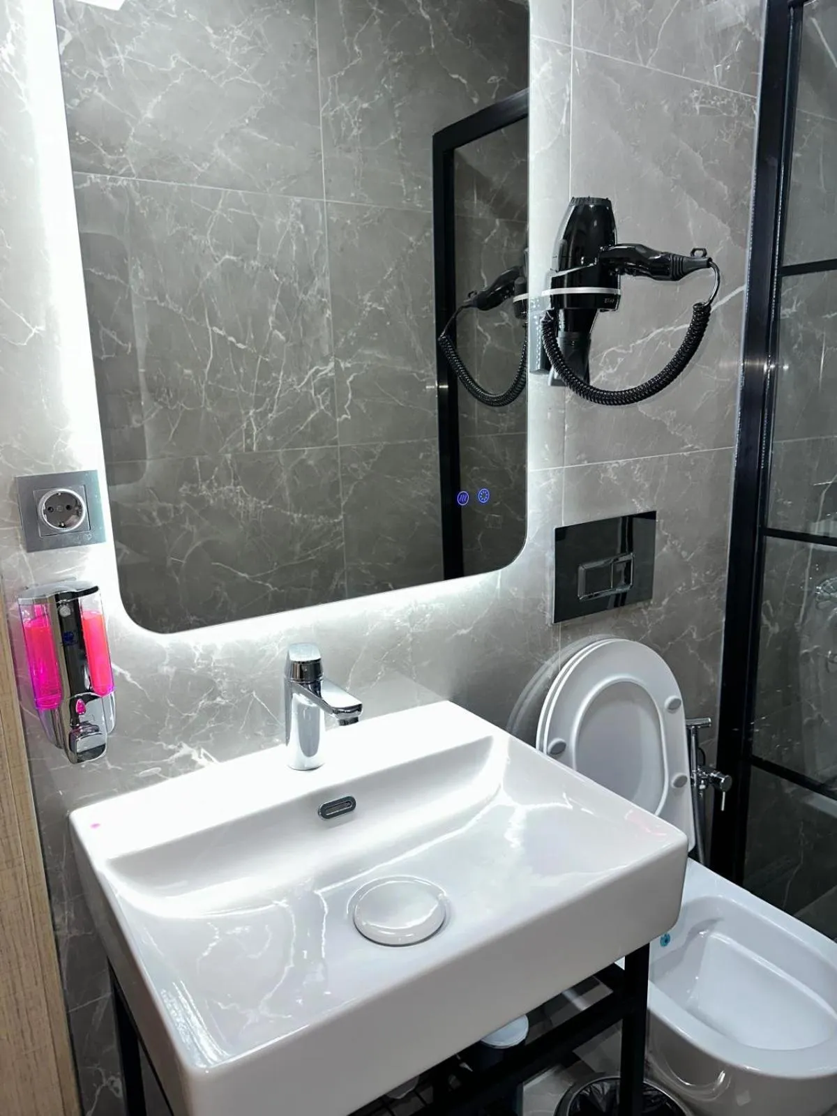 Bathroom in Grand FM Hotel