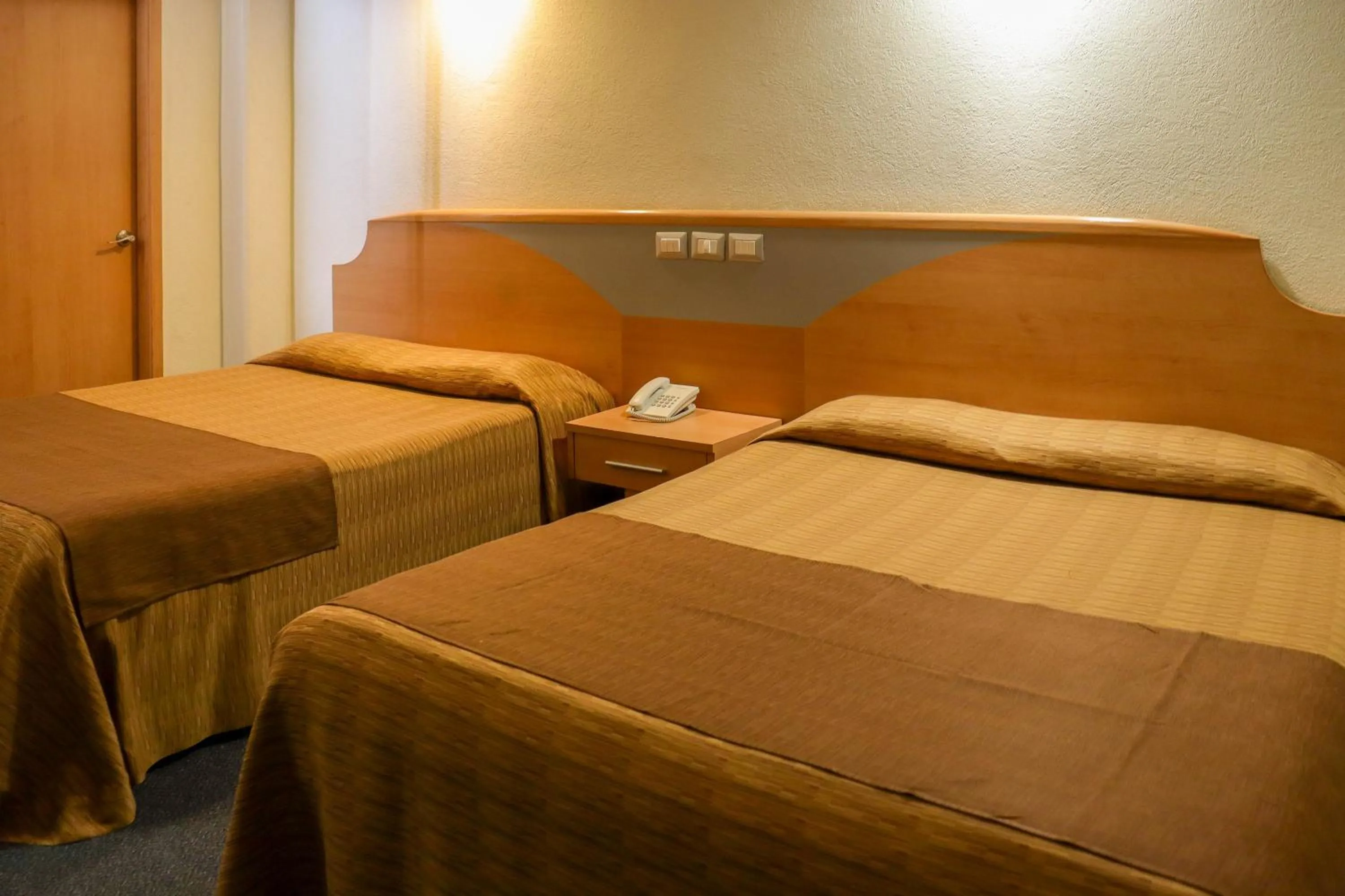 Bed in Hotel Milan CDMX