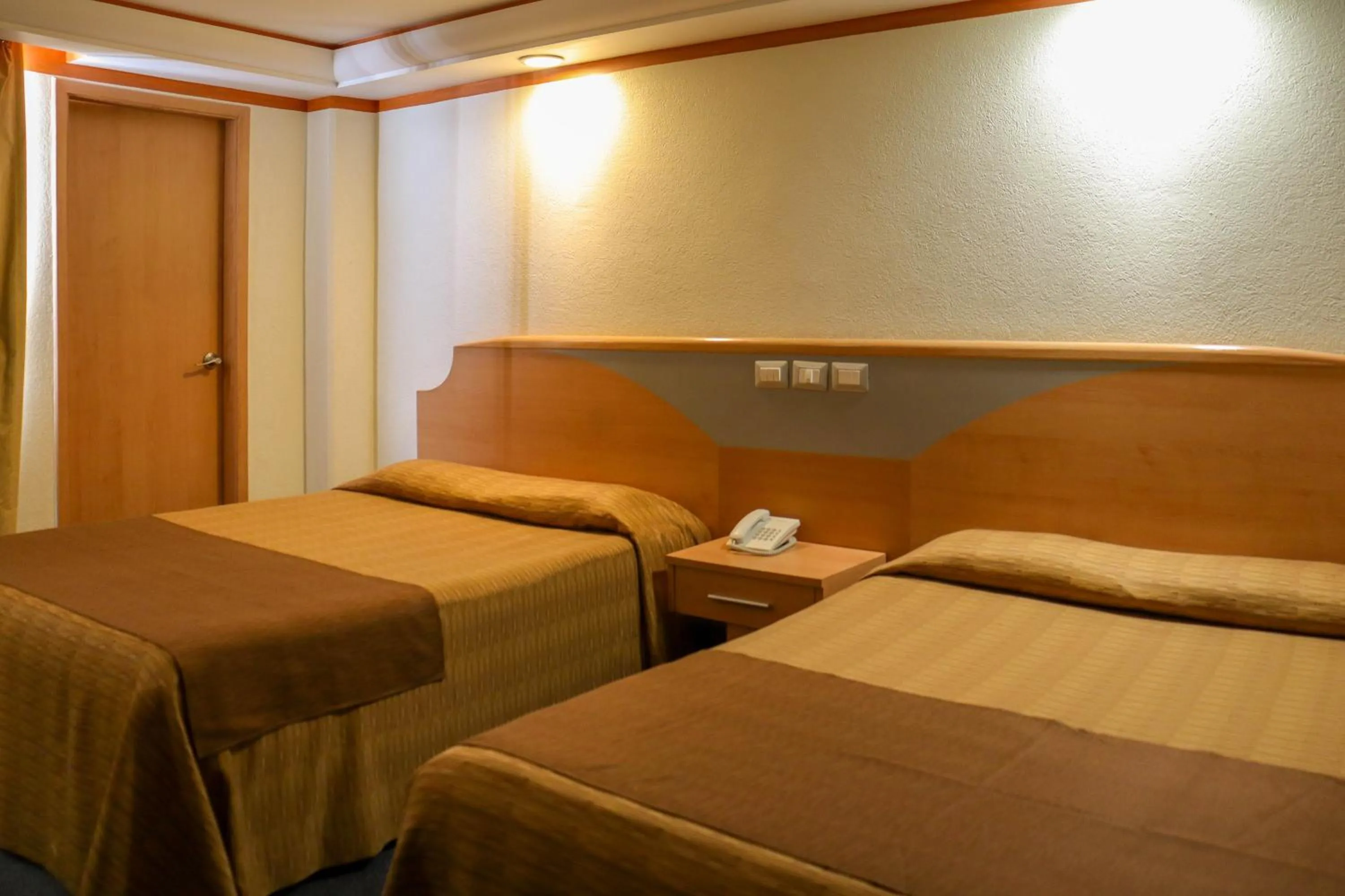 Bed in Hotel Milan CDMX