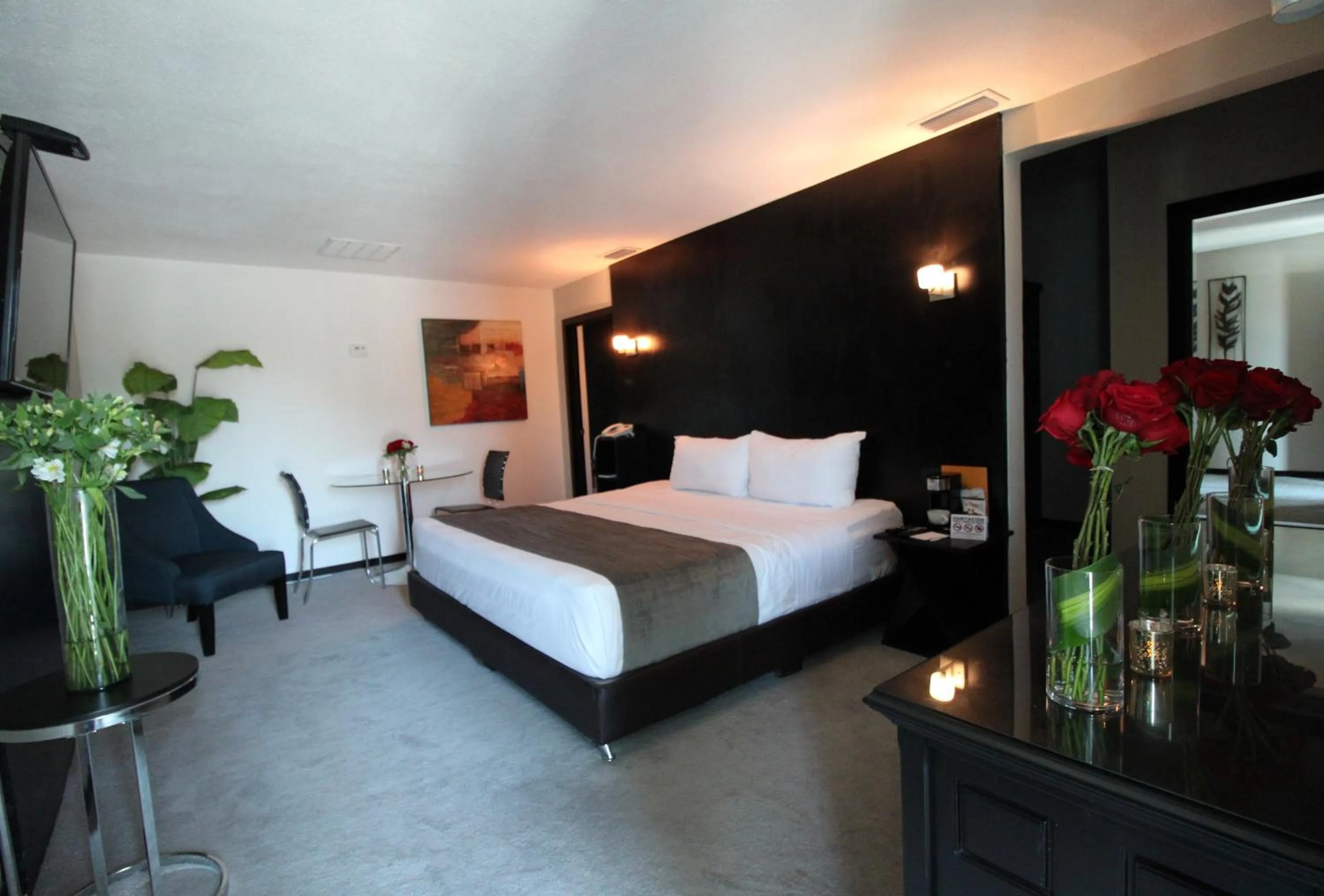 Living room, Bed in Stay Inn Hotels