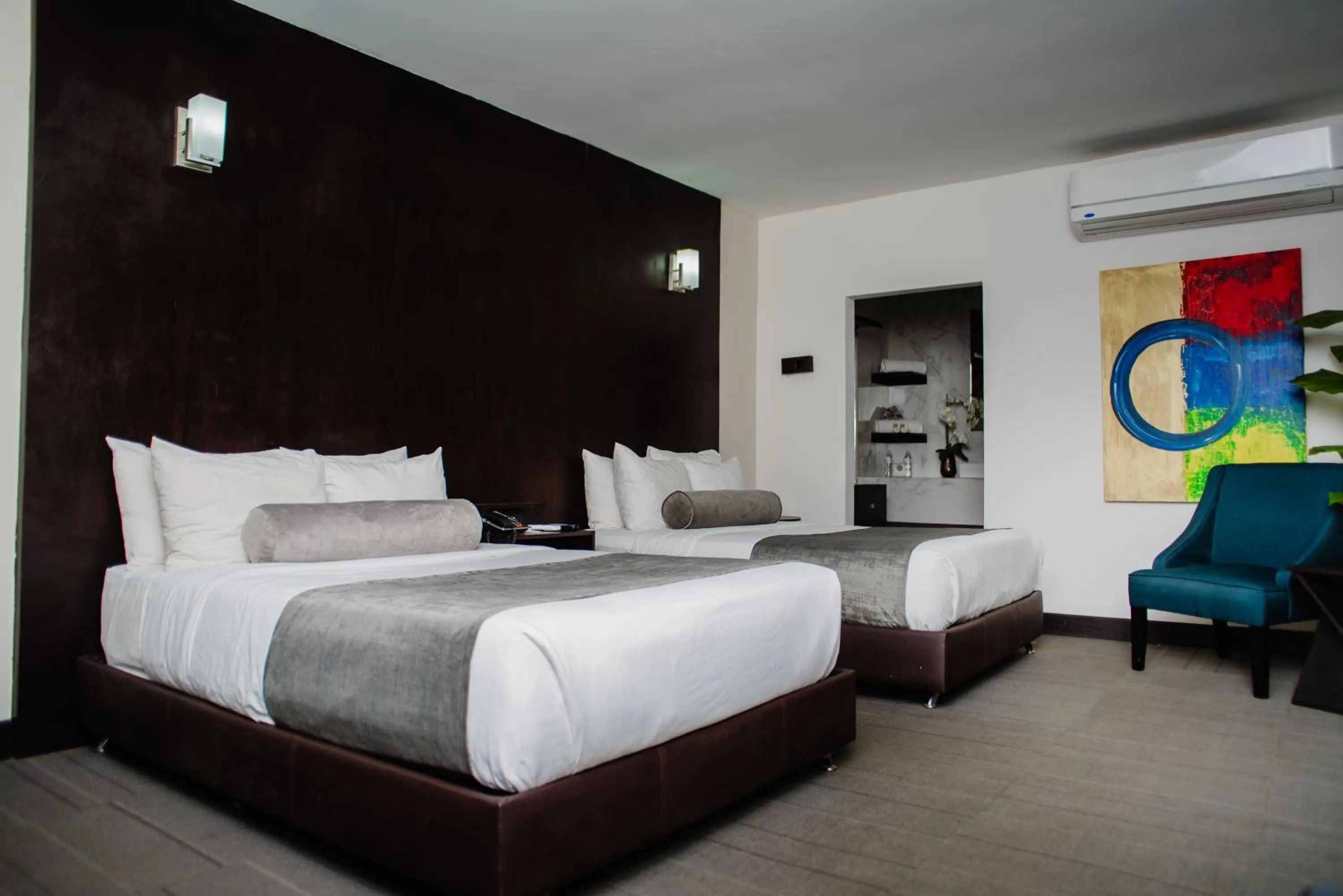 Bed in Stay Inn Hotels