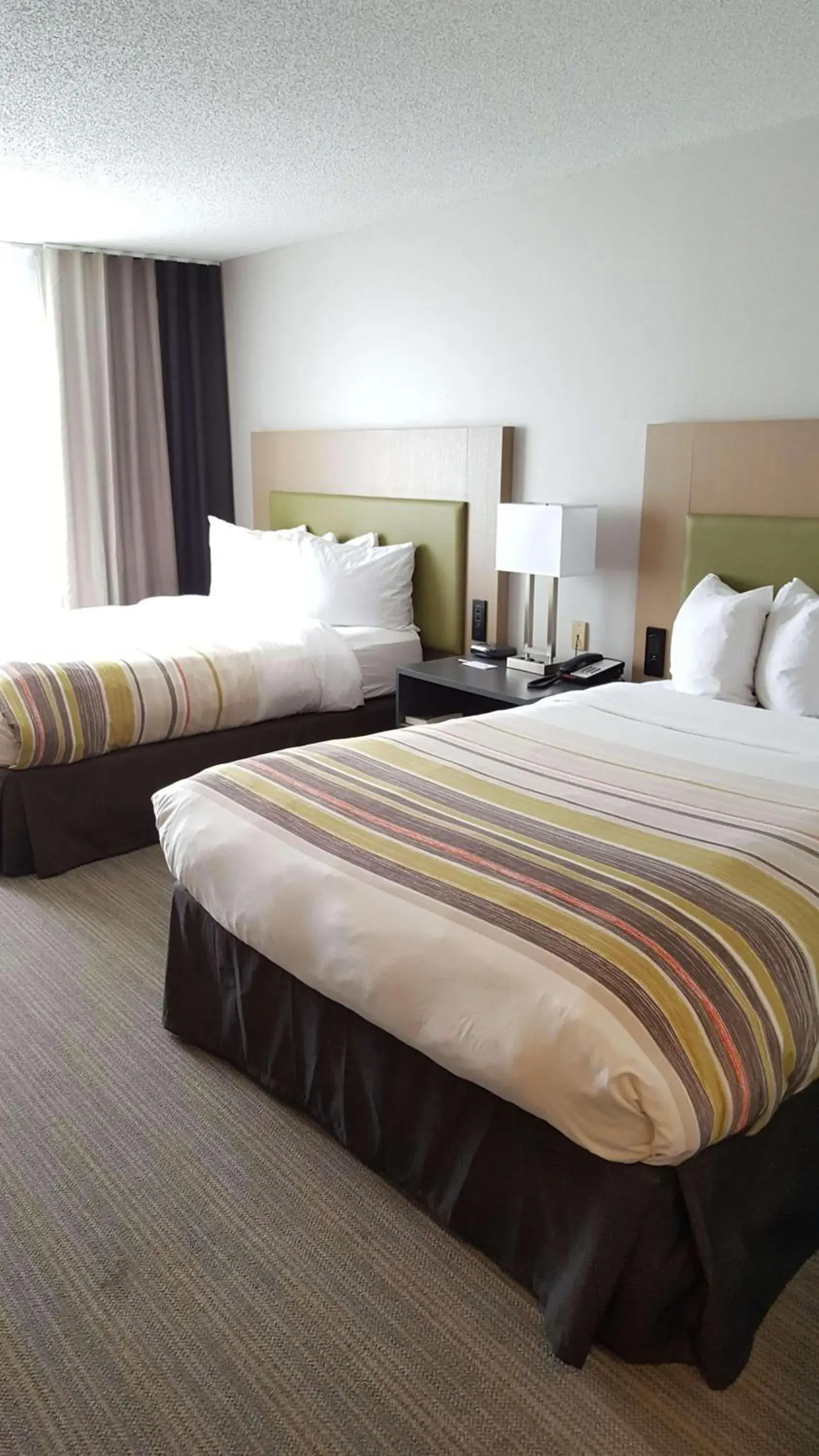 Bedroom in Country Inn & Suites by Radisson, Elk River, MN Bedroom in Country Inn & Suites by Radisson, Elk River, MN