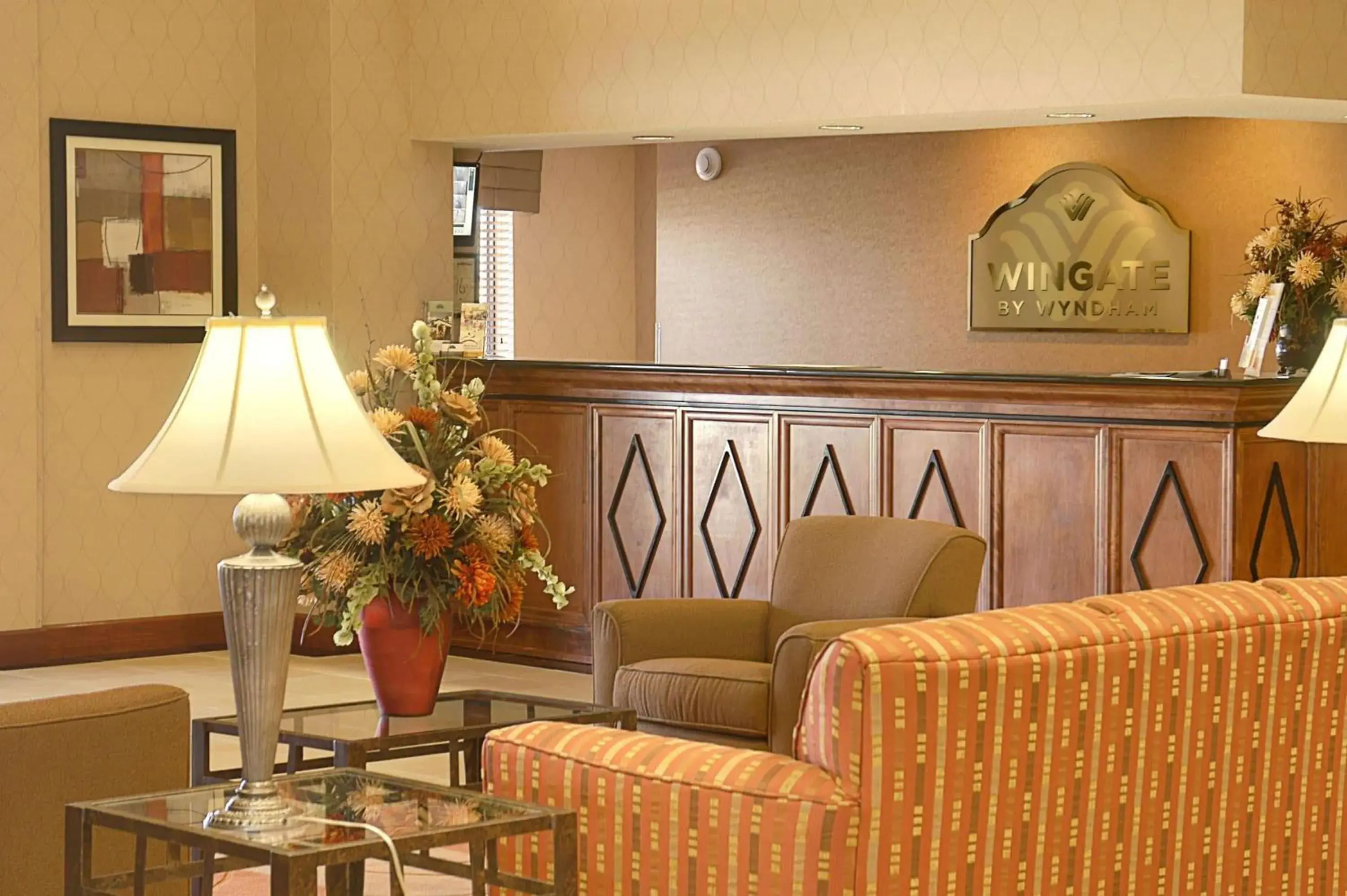 Lobby or reception in Wingate By Wyndham - Warner Robins Lobby or reception in Wingate By Wyndham - Warner Robins