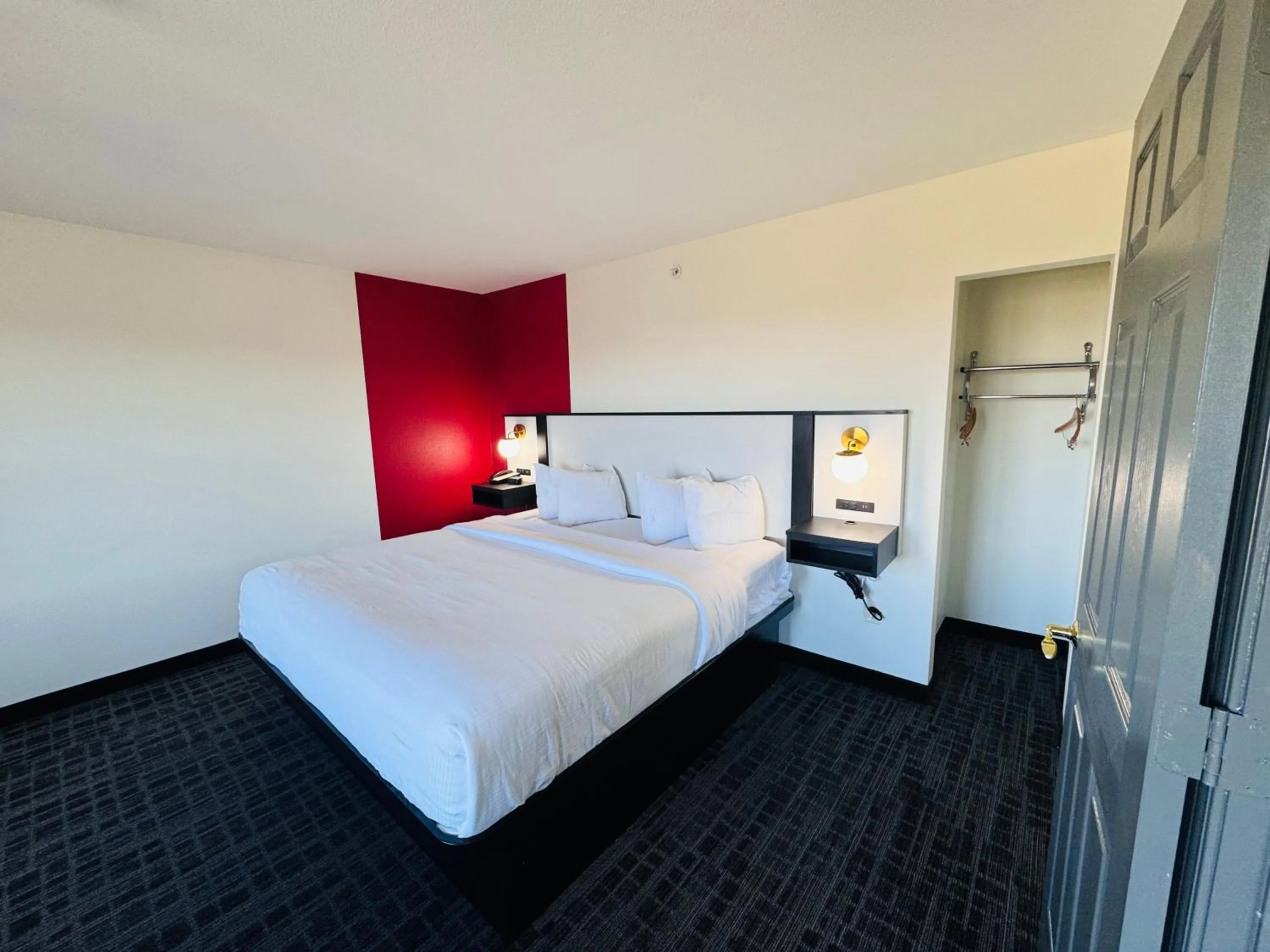 Bed in Ramada by Wyndham Sparta/At Speedway