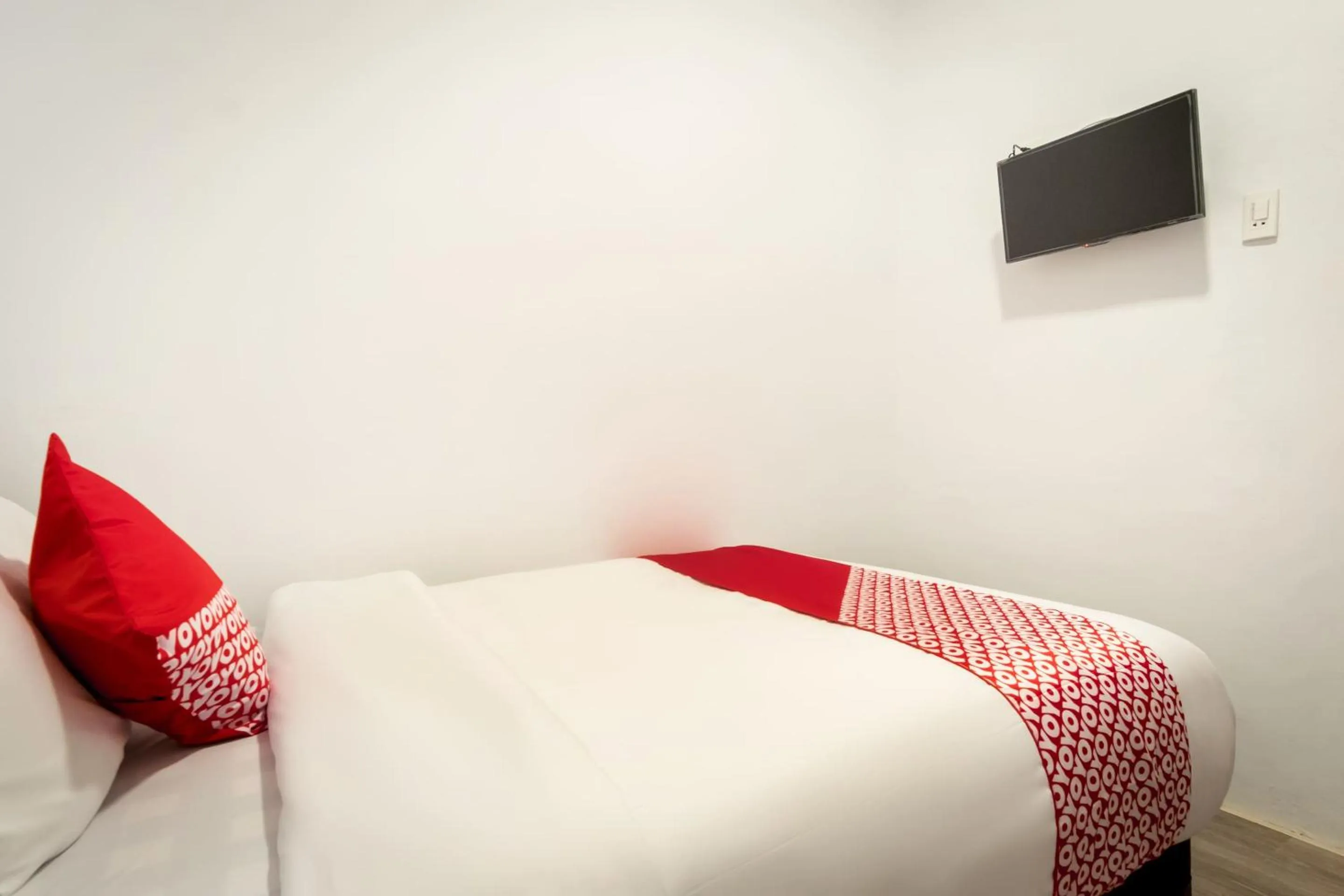 Bedroom, Bed in Hotel O Metropolitan Homestay Near Komplek Asia Megamas Medan