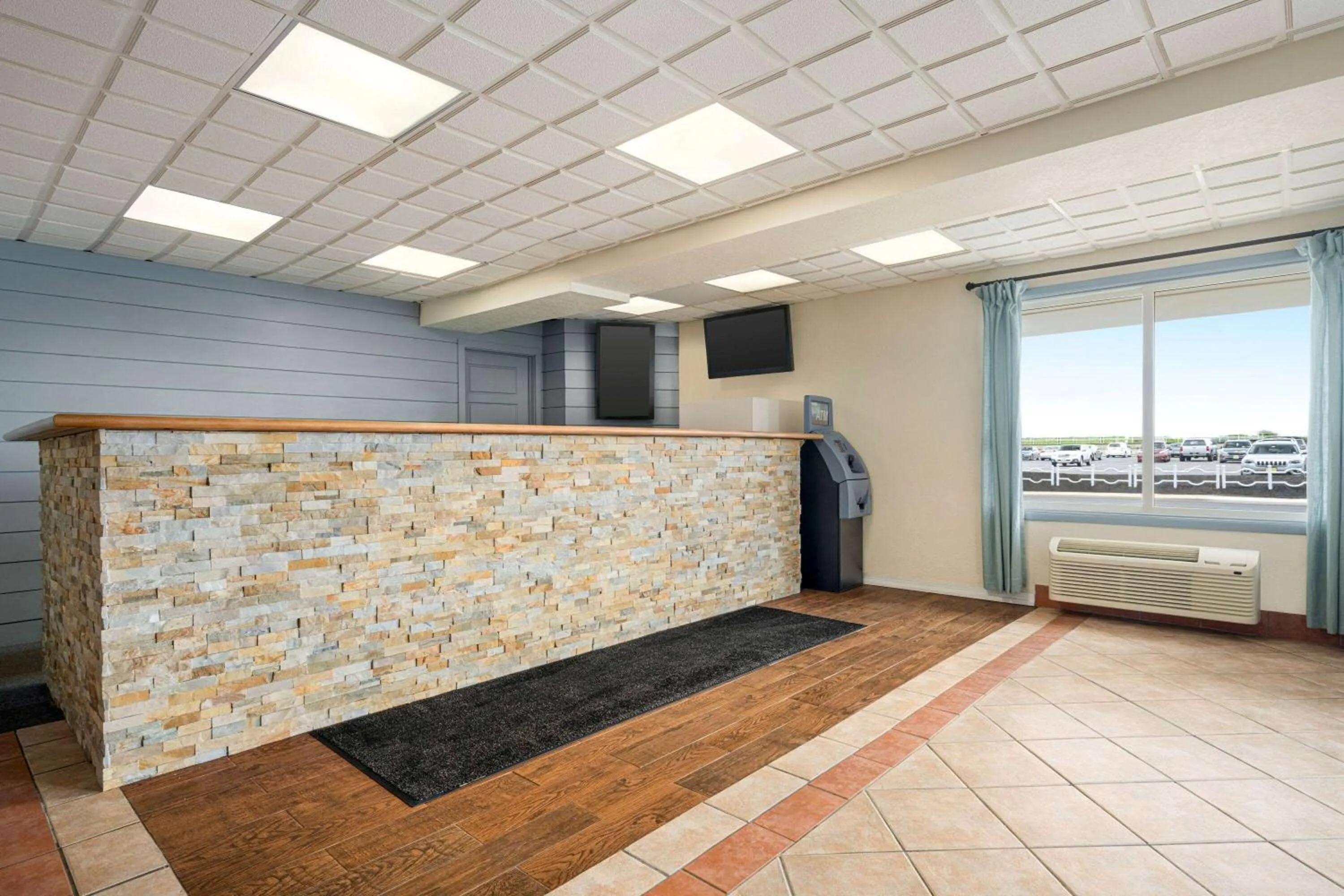 Lobby or reception in Days Inn & Suites by Wyndham Wildwood