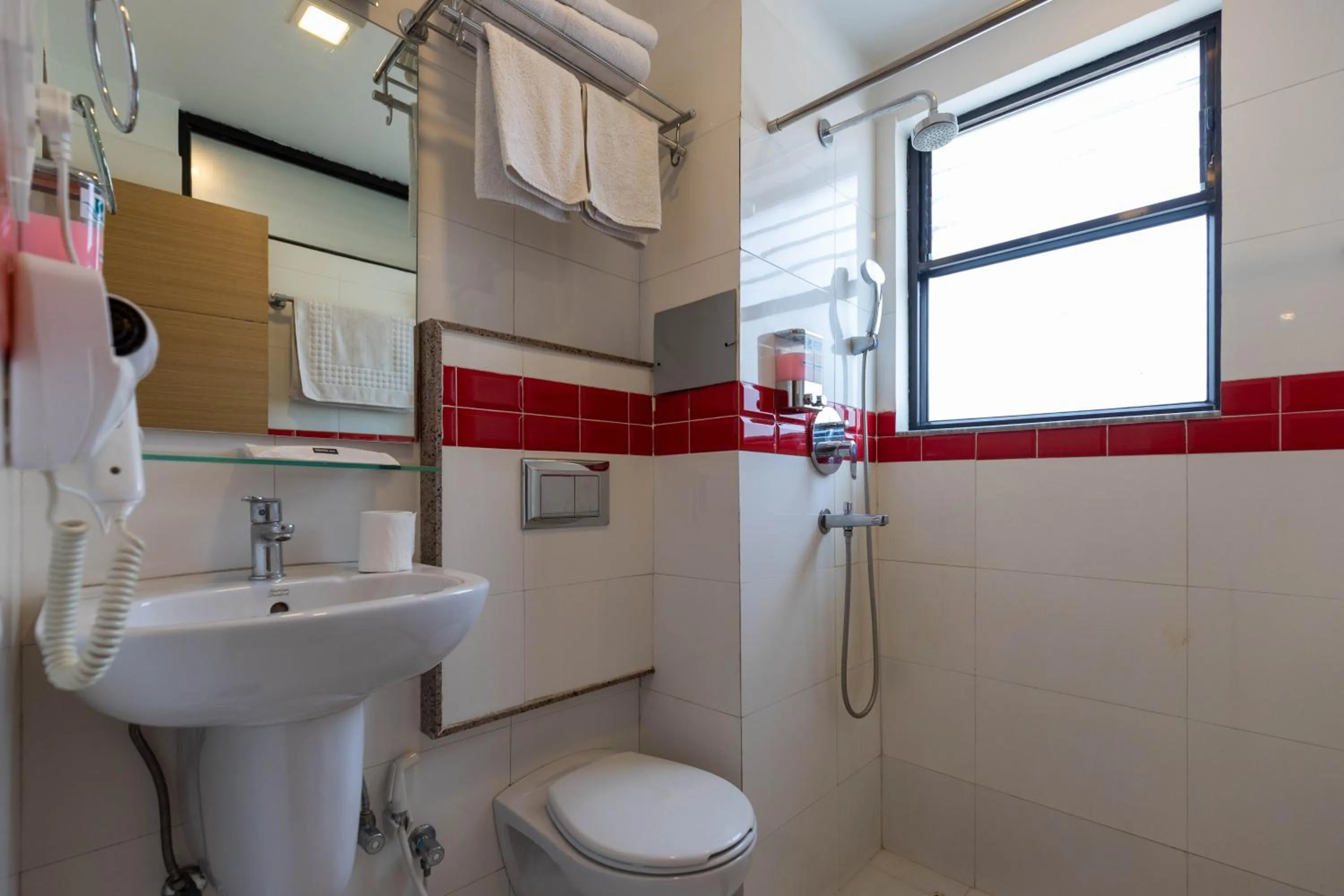 Toilet in Sarovar Residency Serviced Apartment Hotel