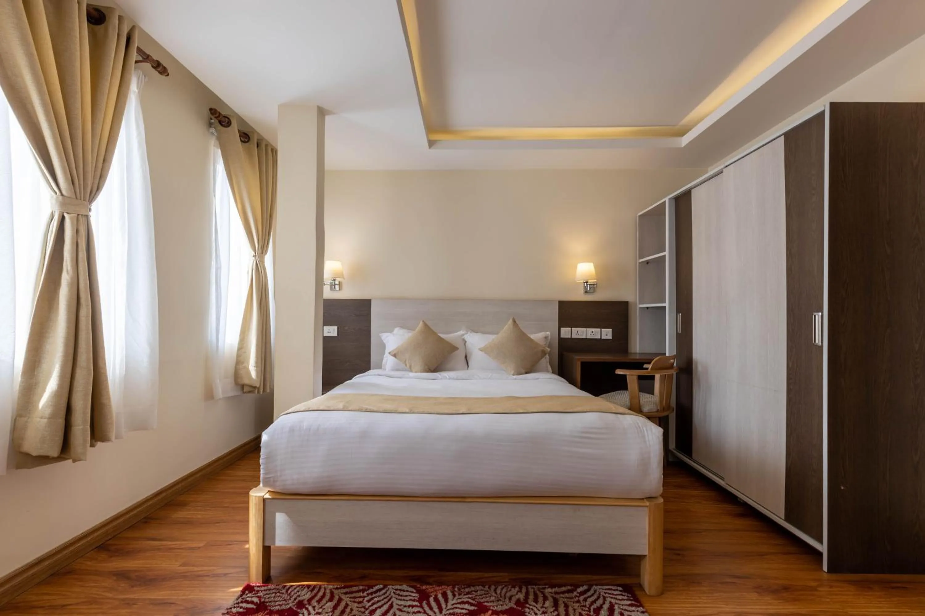 Bed in Sarovar Residency Serviced Apartment Hotel