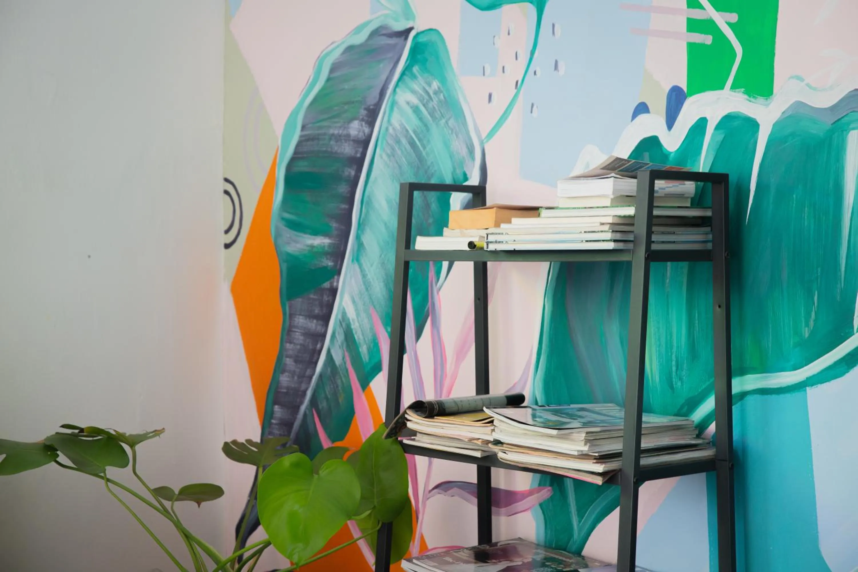 Communal lounge/ TV room in Sleep Here Hostel, Melaka