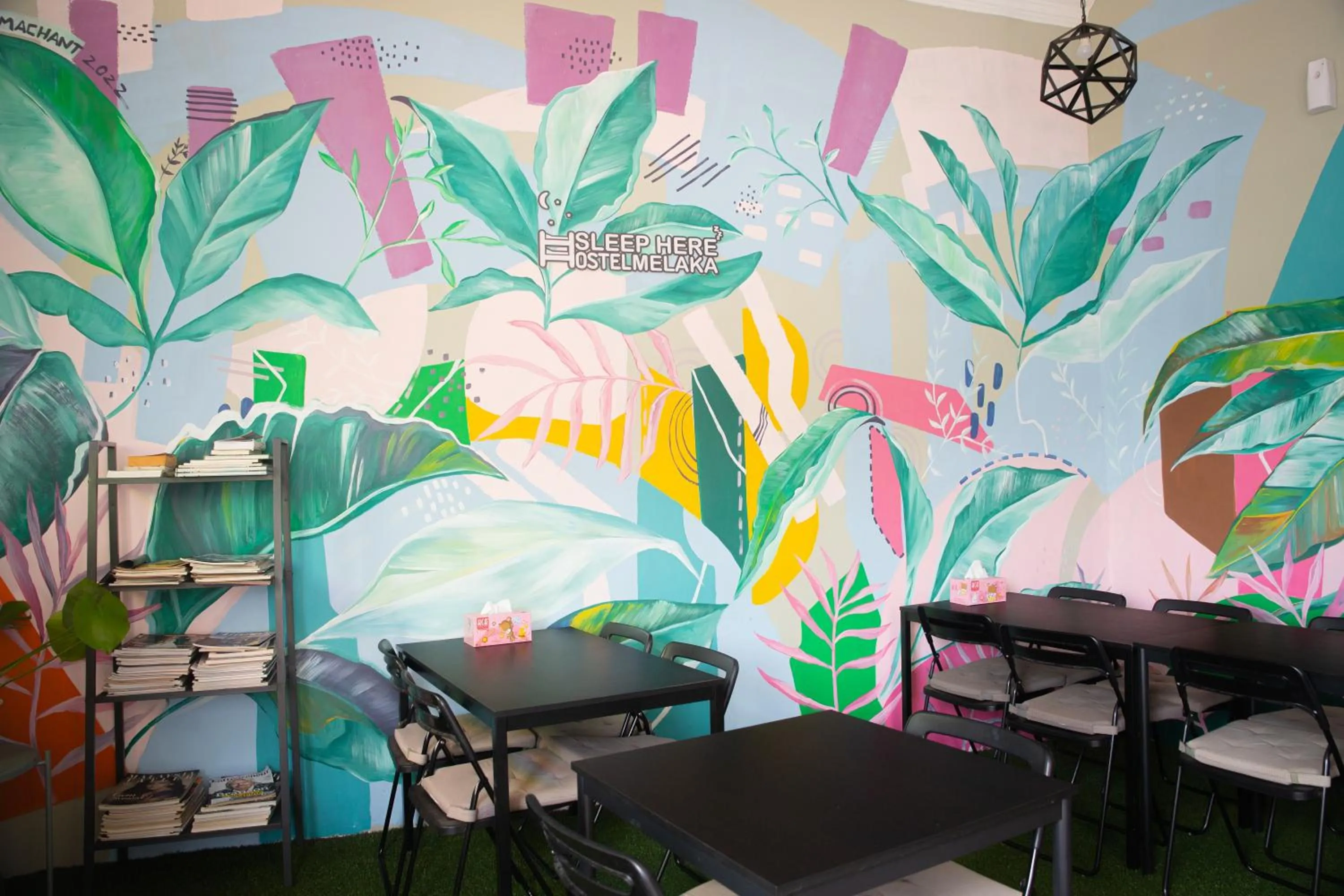 Communal lounge/ TV room in Sleep Here Hostel, Melaka