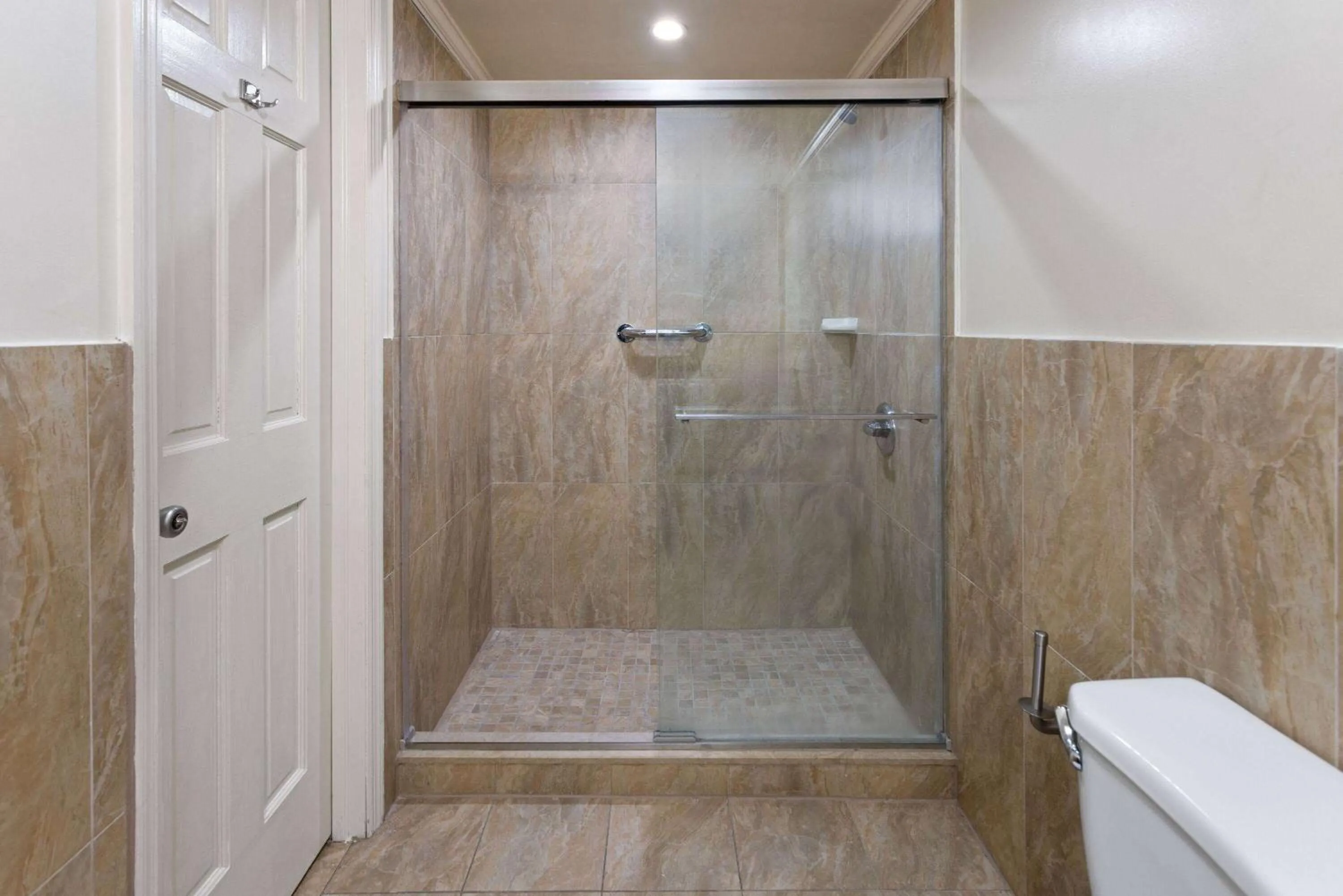 Bathroom in Travelodge by Wyndham Manhasset