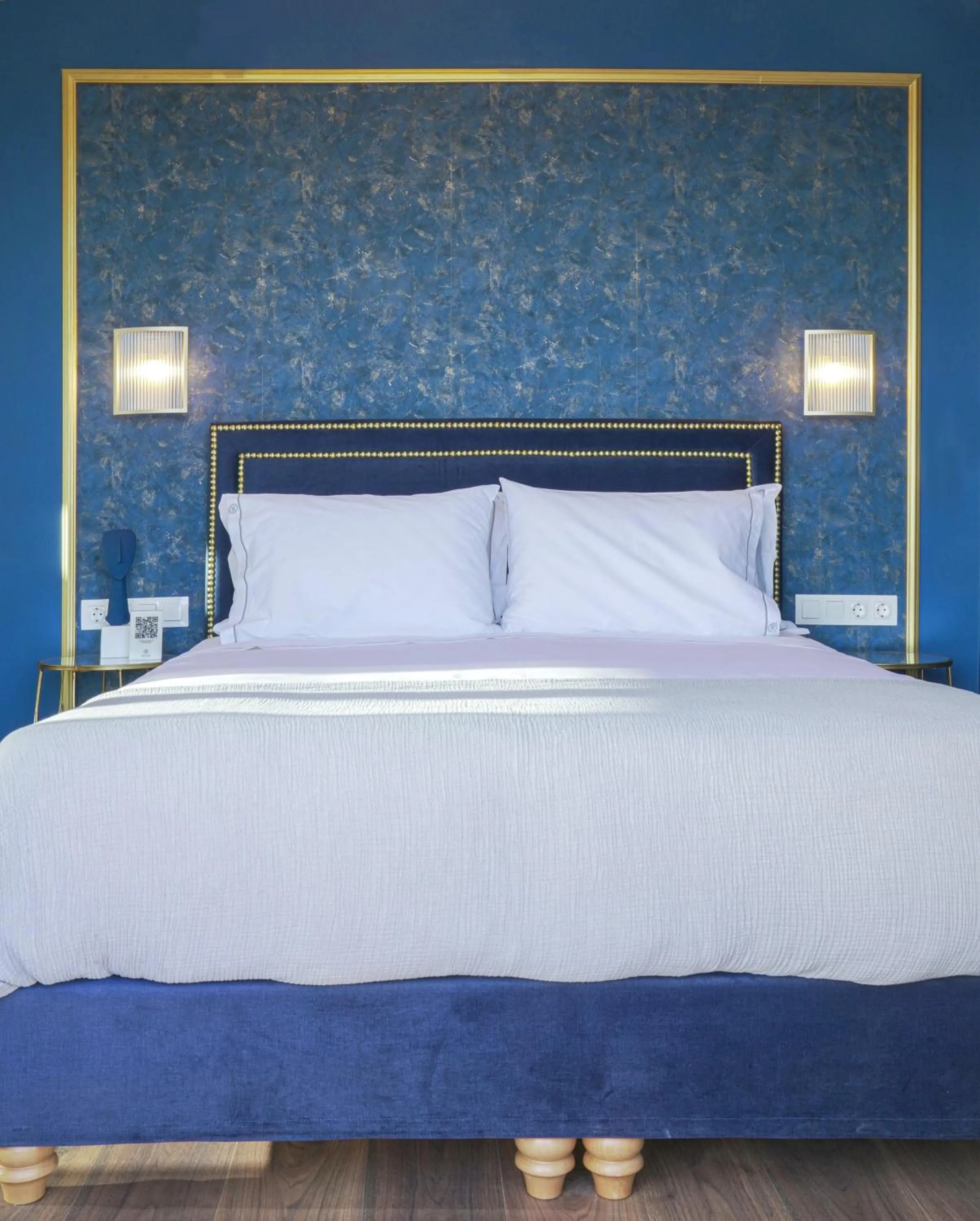 Bed in Pafsilipon Suites