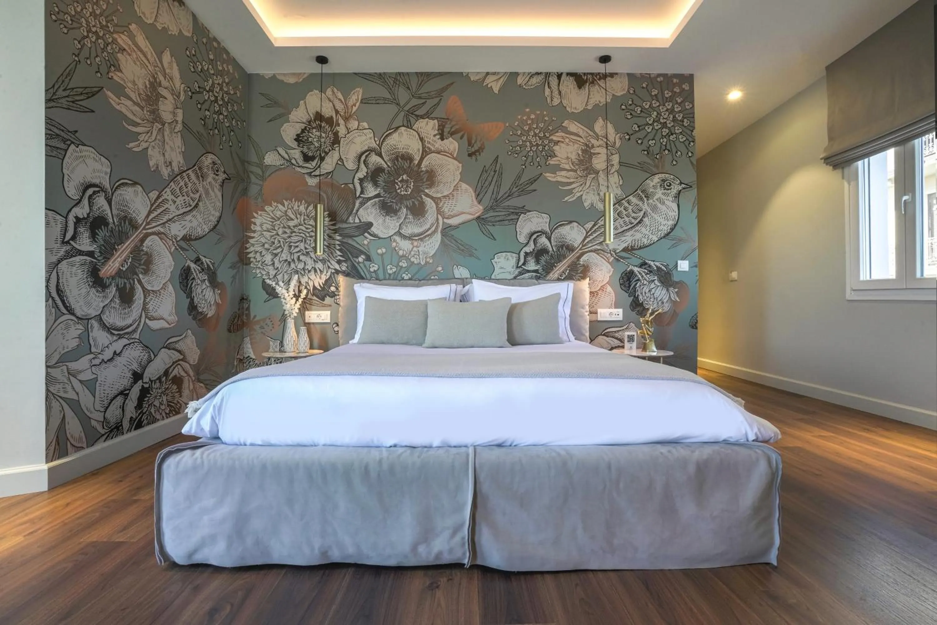 Bed in Pafsilipon Suites