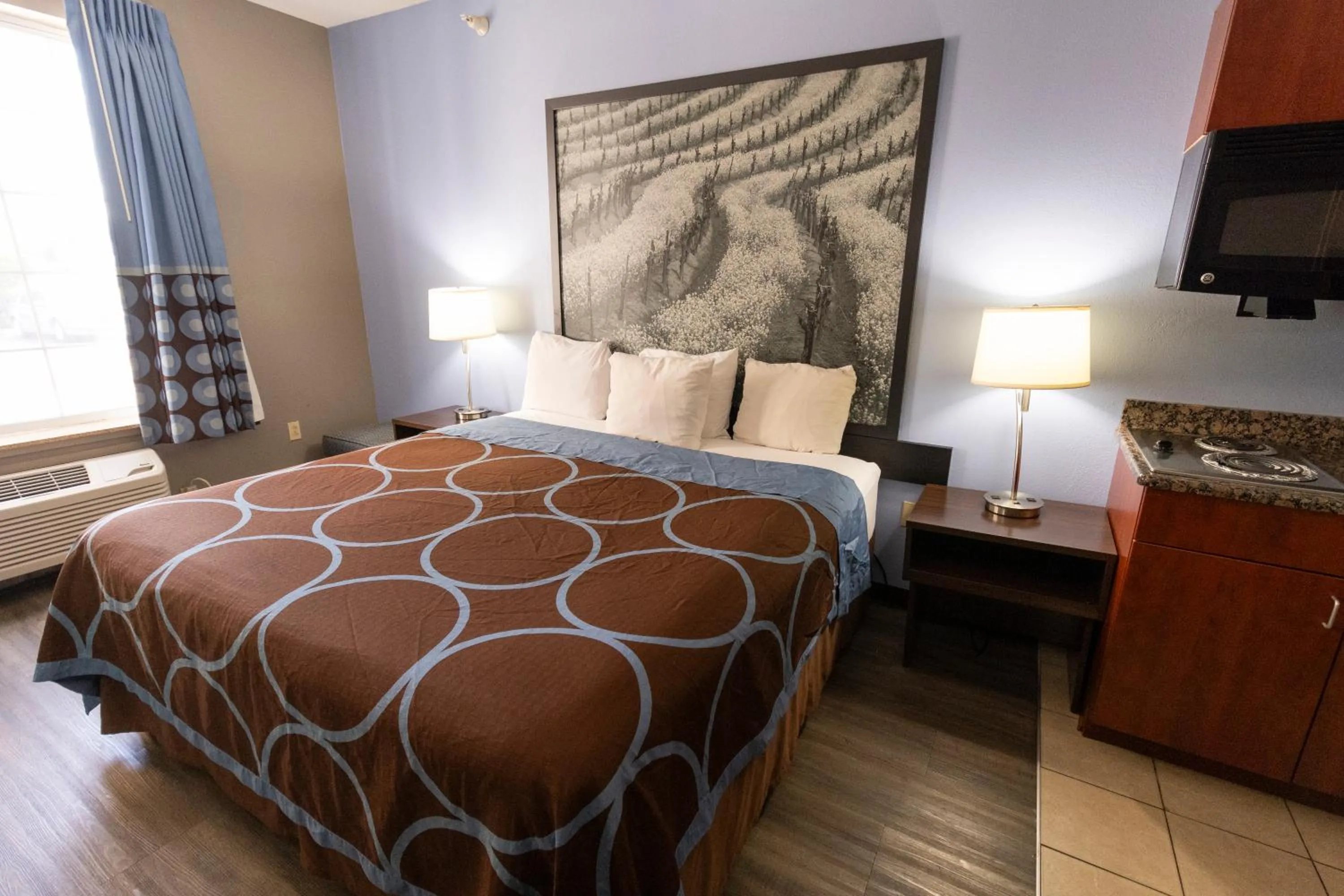 Bed in Super 8 by Wyndham Smithfield-Selma