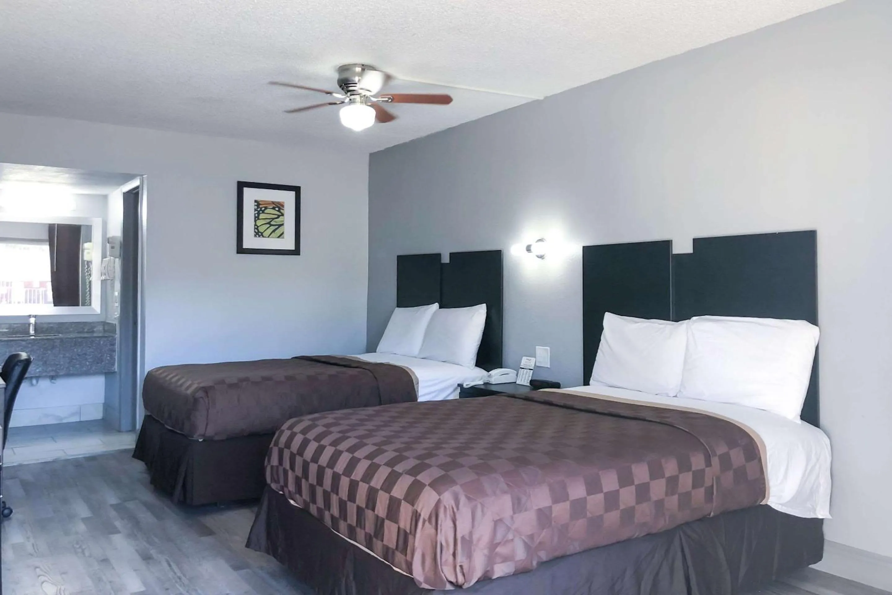 Bedroom, Bed in Rodeway Inn Sun City Center