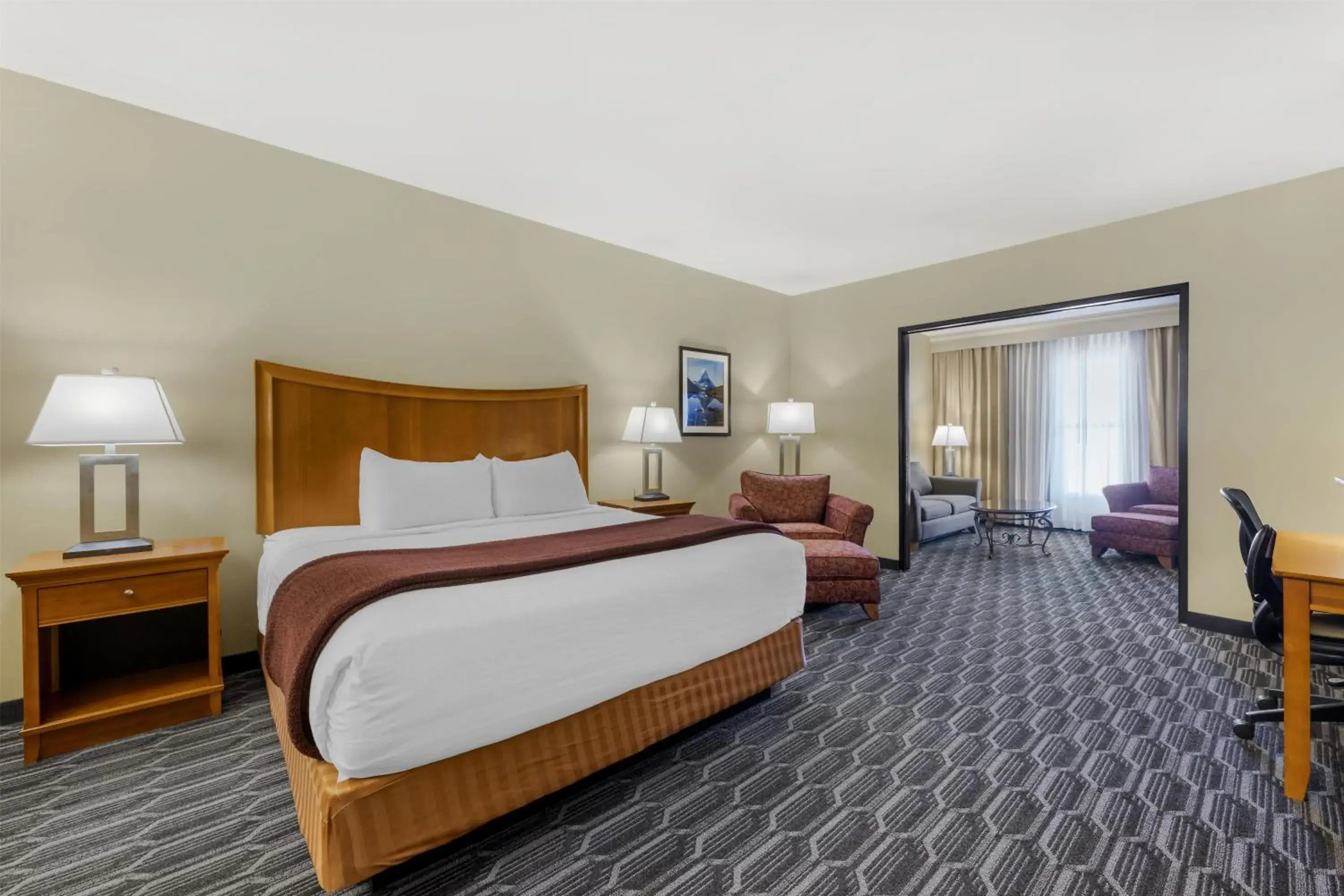 Bedroom, Bed in Best Western Plus Swiss Chalet Hotel & Suites Bedroom, Bed in Best Western Plus Swiss Chalet Hotel & Suites