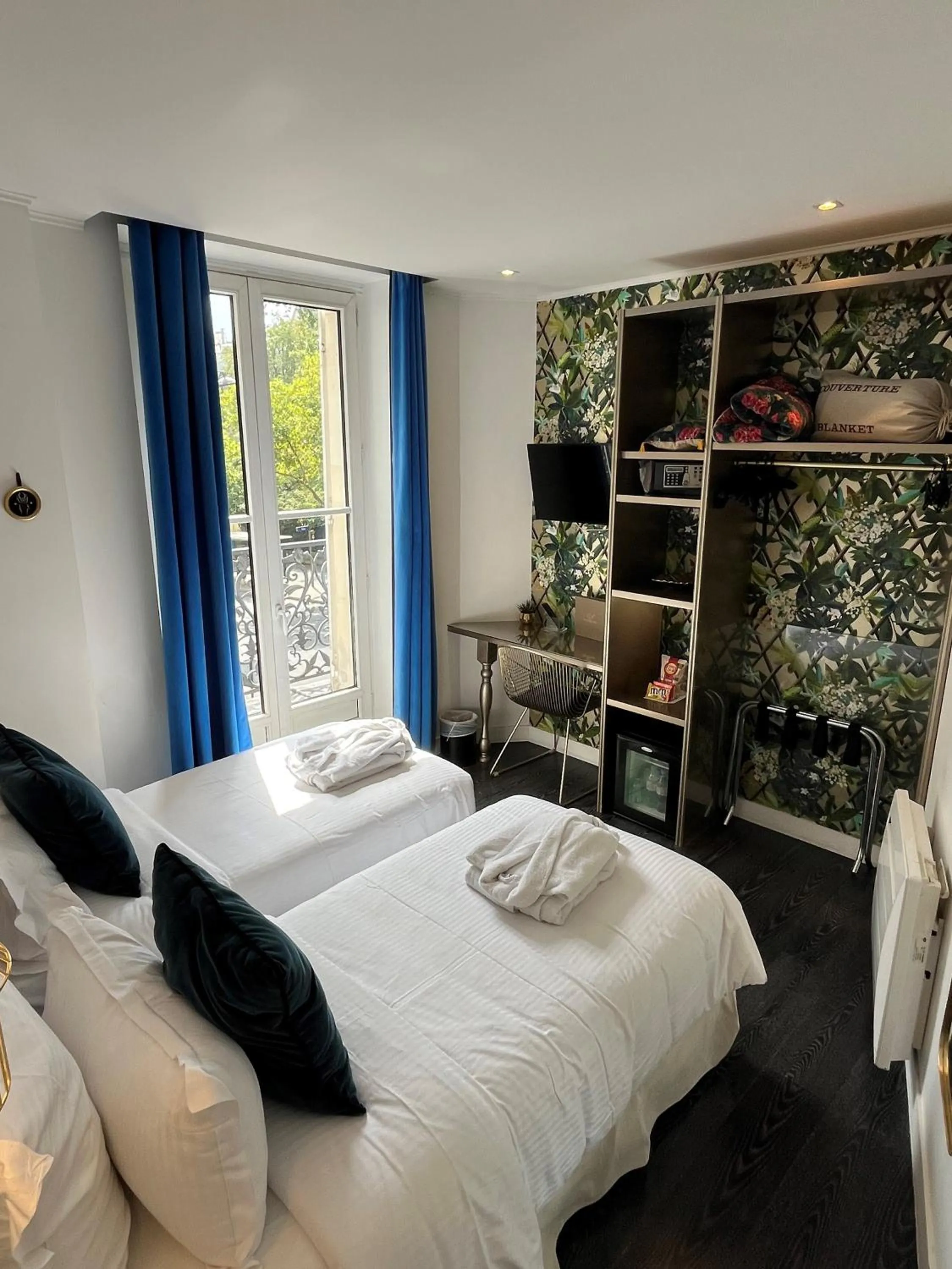 Bed in Hotel Cluny Square