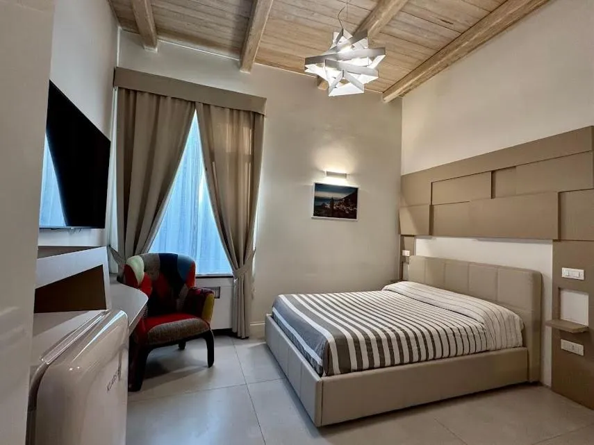 Bed in Le Suite del Duomo