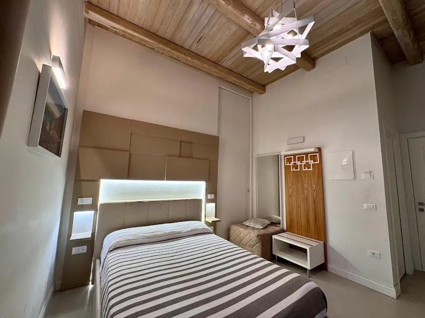 Bed in Le Suite del Duomo