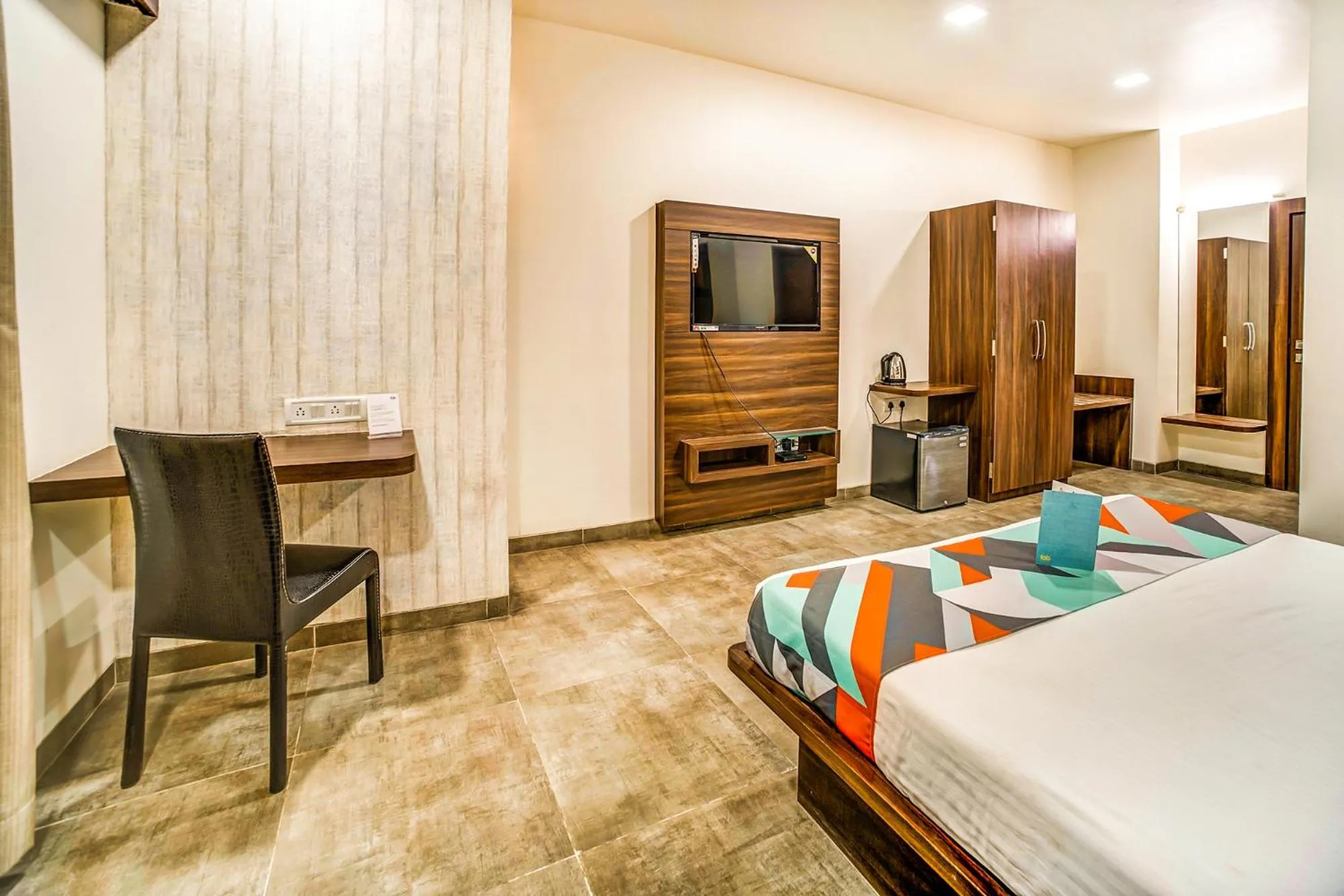 Bed in FabHotel Global Inn - Nr Sanjeevani Children's Hospital